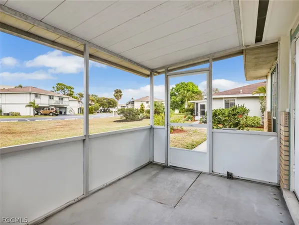 a bathroom with a tub and sink view