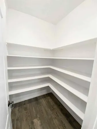 a view of small space with racks on the wall