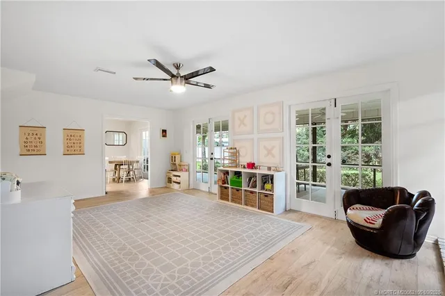 a kitchen with a sink refrigerator and window