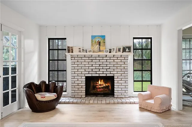 a kitchen with a sink appliances and cabinets