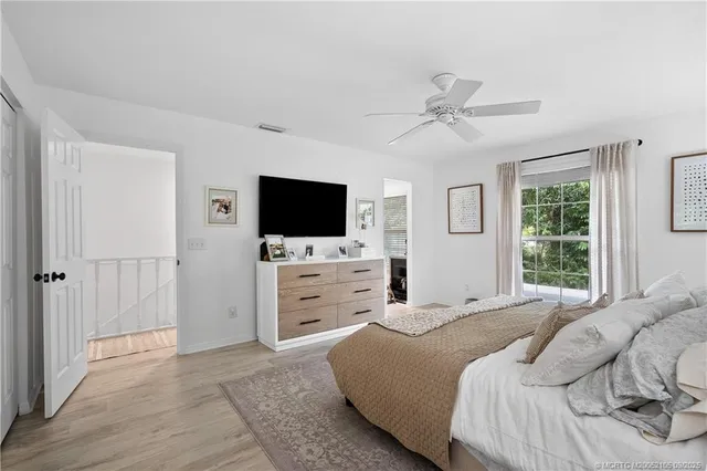 a view of a kitchen with sink and cabinets