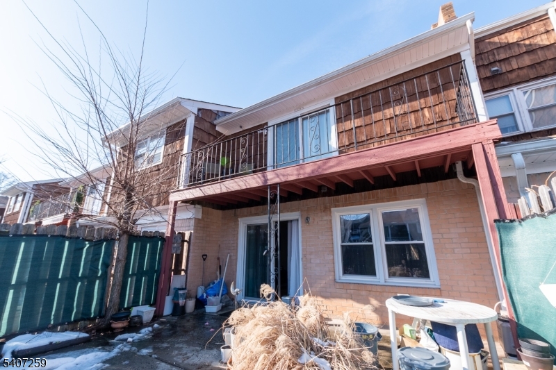 614 West 8th Street, Unit 15 Plainfield, NJ 07060 - Photo 26 of 28 a front view of a house with a porch
