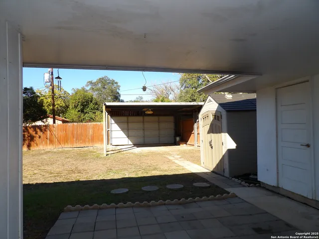 a view of balcony with furniture