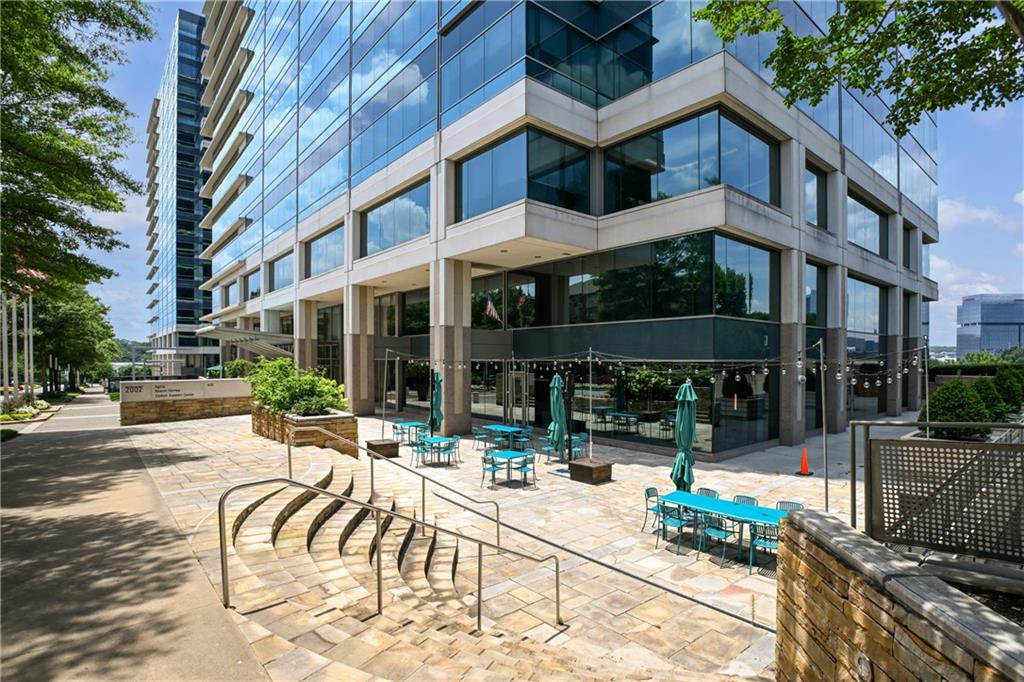10 Perimeter Summit Boulevard, Unit 3311 Atlanta, GA 30319 - Photo 26 of 68 a view of a building with sitting area