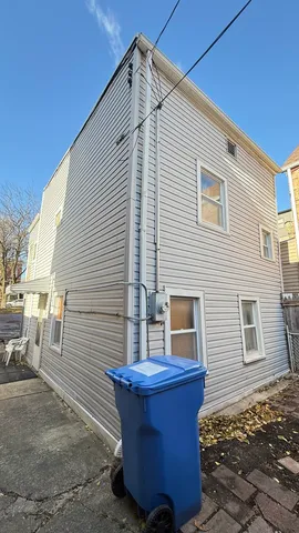 a front view of a house with outdoor area