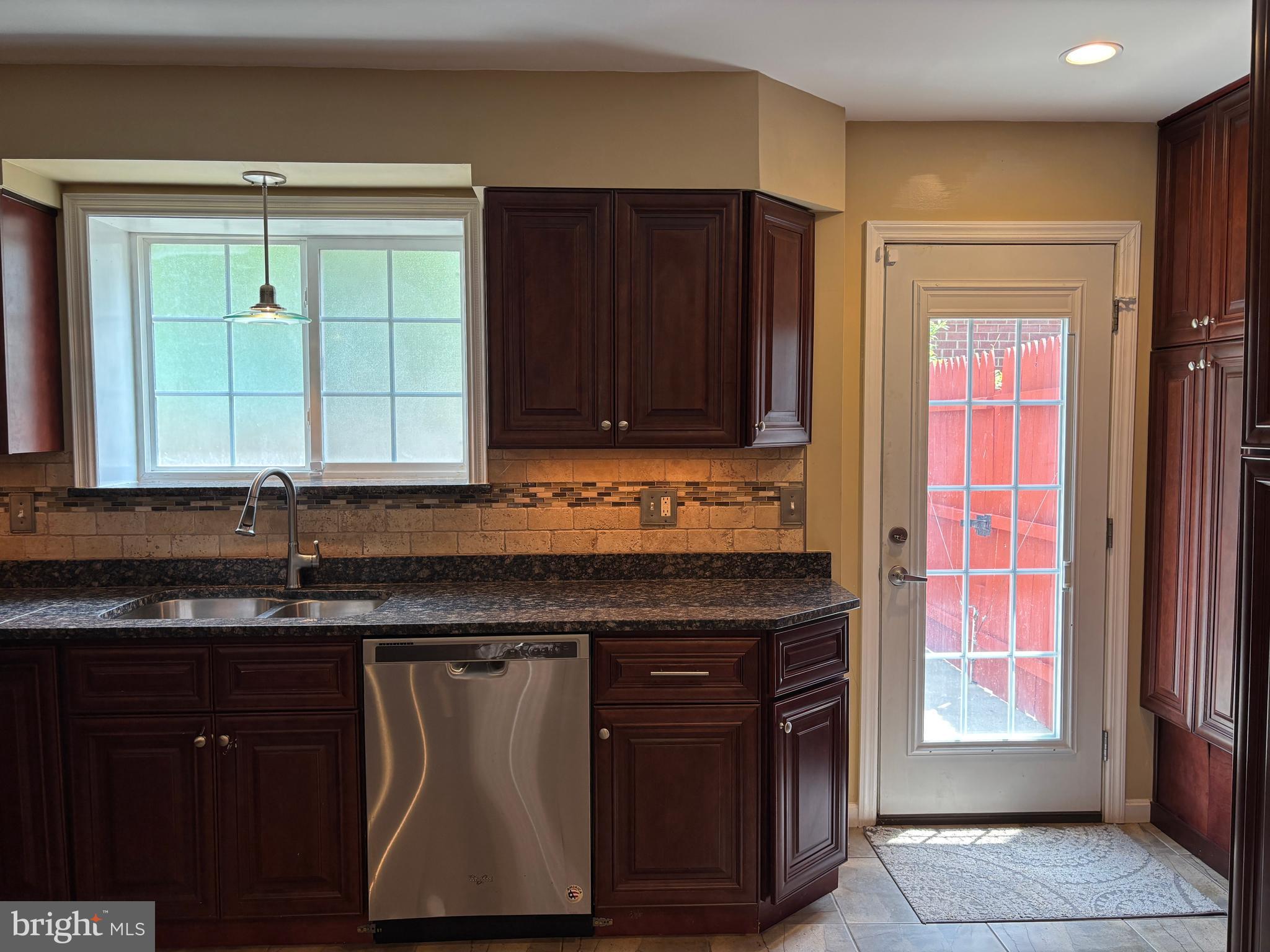 3913 Parsons Road Chevy Chase, MD 20815 - Photo 28 of 43 Kitchen Door Leading to Driveway