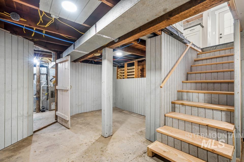 253 West Court Street Weiser, ID 83672 - Photo 15 of 35 Basement with stairway and heating unit