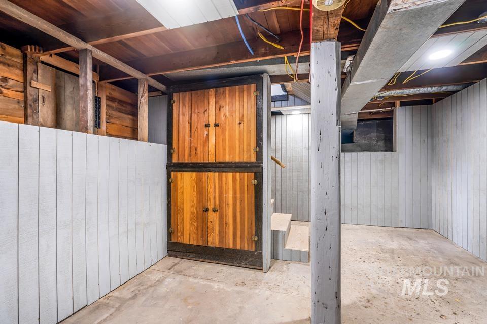 253 West Court Street Weiser, ID 83672 - Photo 16 of 35 Unfinished basement with wooden walls