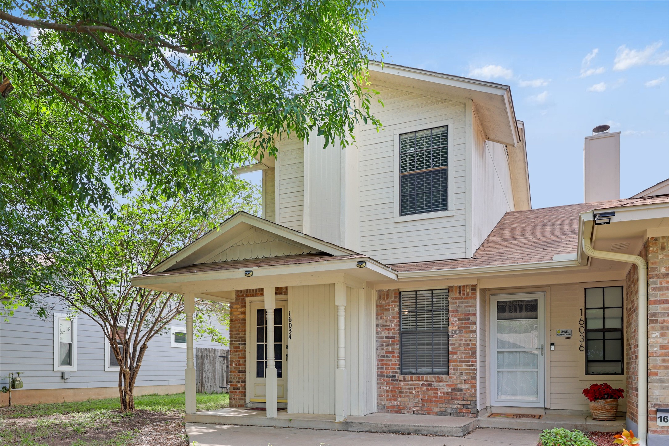 16034 Stoneham Circle Pflugerville, TX 78660 - Photo 1 of 1 a front view of a house with garden