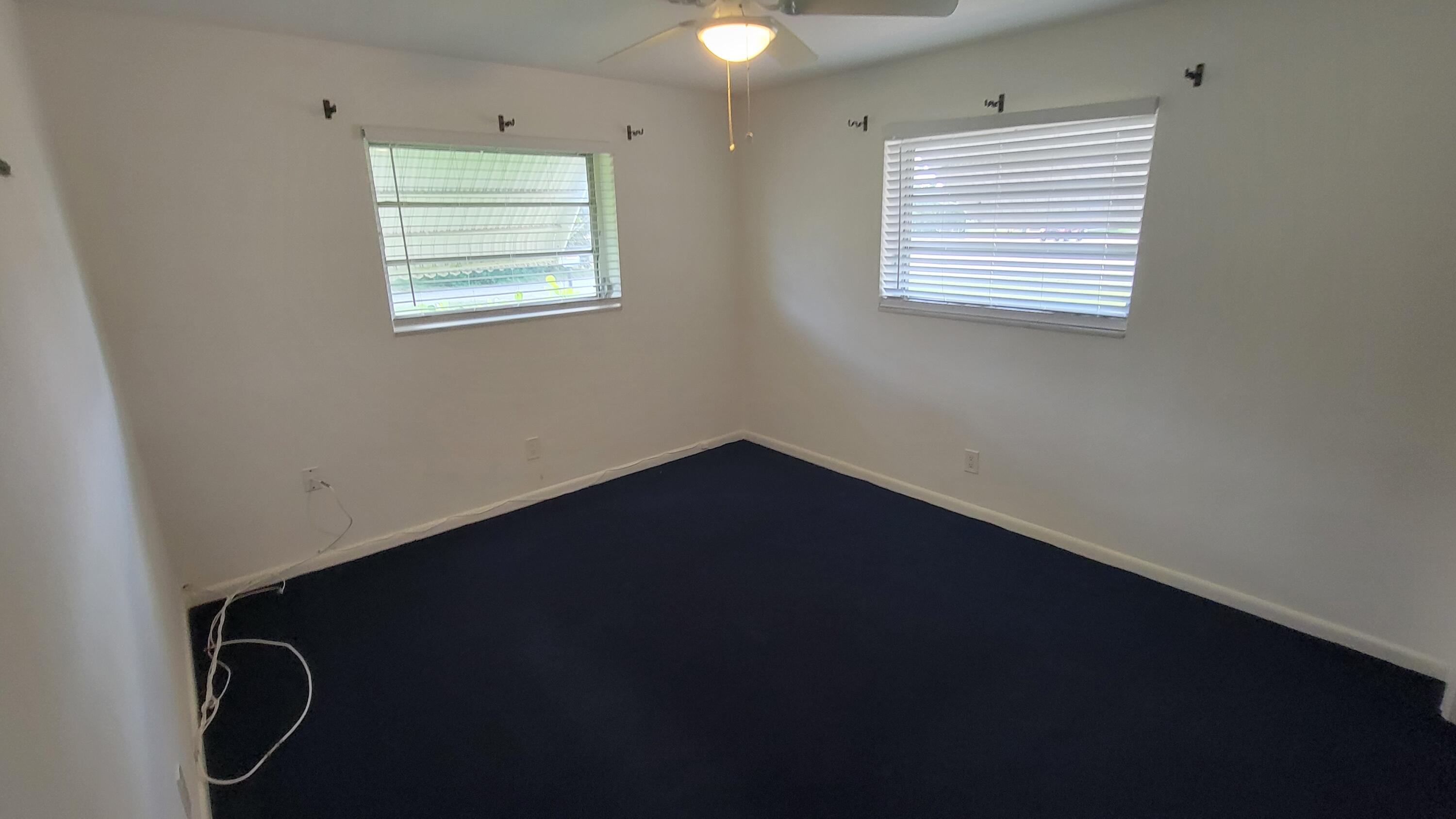 3340 Jog Road Greenacres, FL 33467 - Photo 11 of 20 an empty room with a window