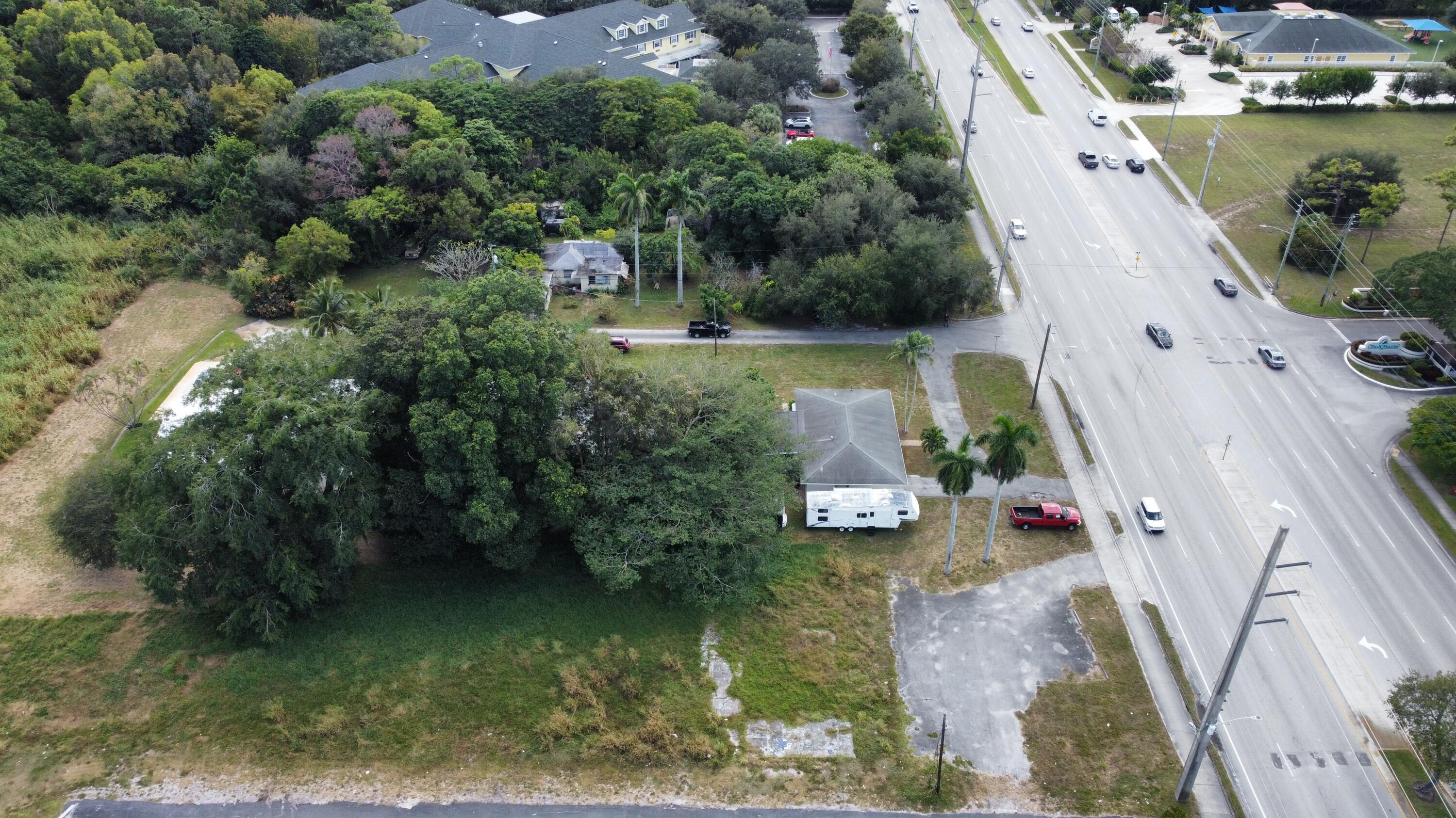 3340 Jog Road Greenacres, FL 33467 - Photo 4 of 20 an aerial view of a house with a yard