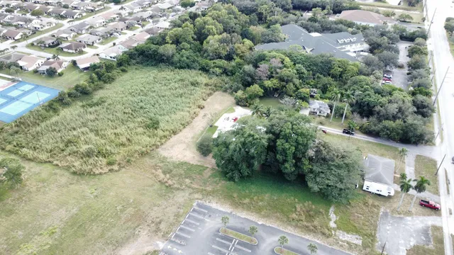 a view of a lake with green space