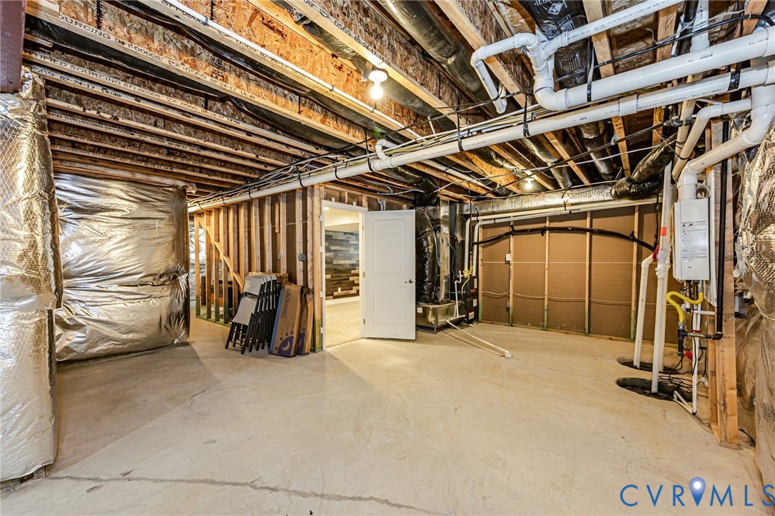 7435 Wicks Road Williamsburg, VA 23188 - Photo 71 of 82 Unfinished basement space featuring exposed wood f