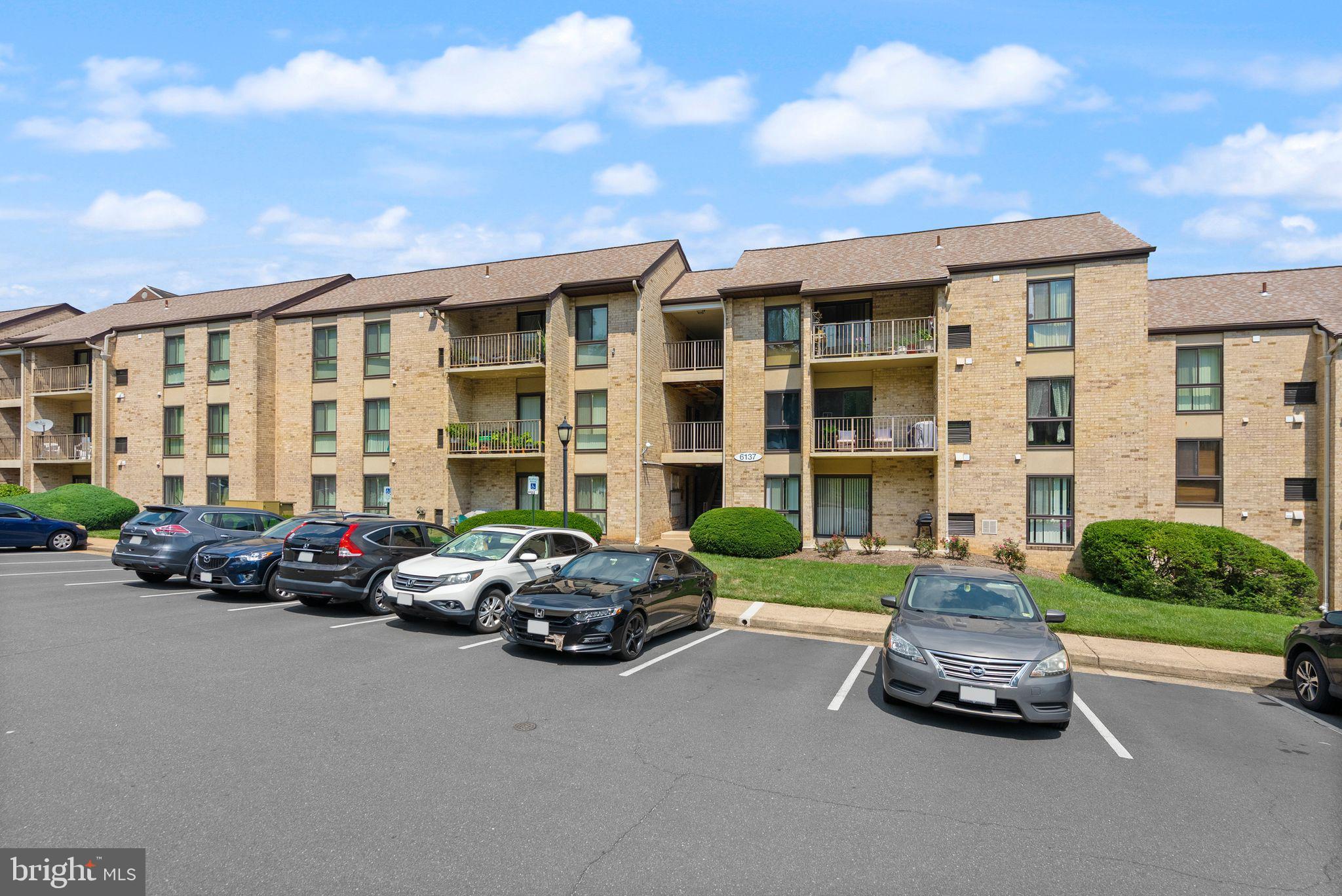 6137 Edsall Road, Unit L Alexandria, VA 22304 - Photo 2 of 36 a car parked in front of a building