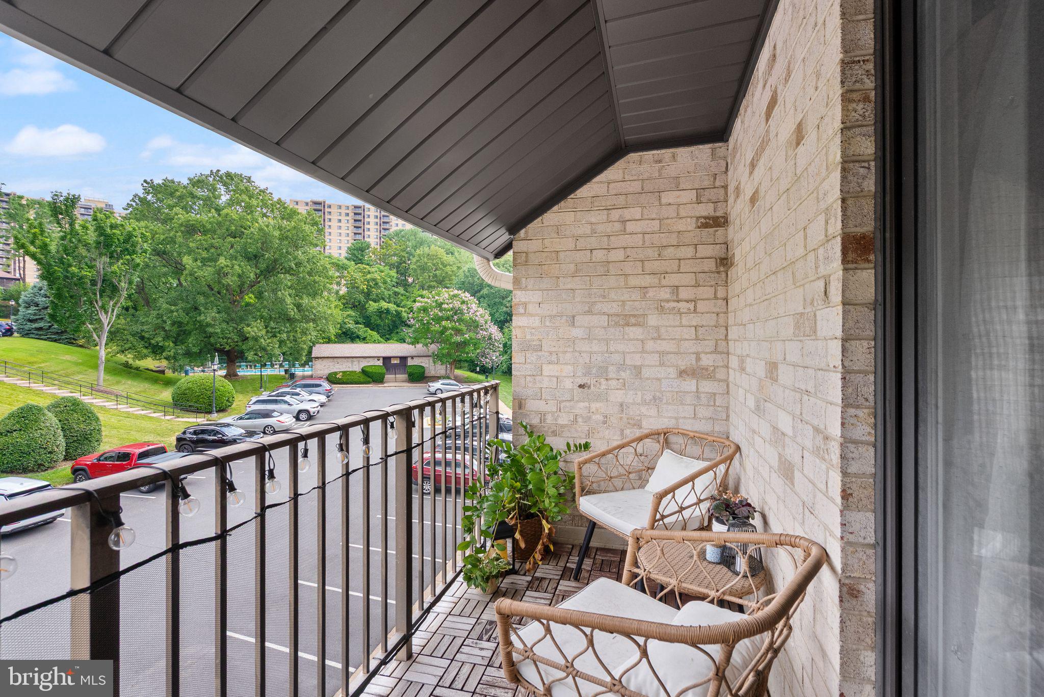 6137 Edsall Road, Unit L Alexandria, VA 22304 - Photo 21 of 36 a view of a balcony with furniture