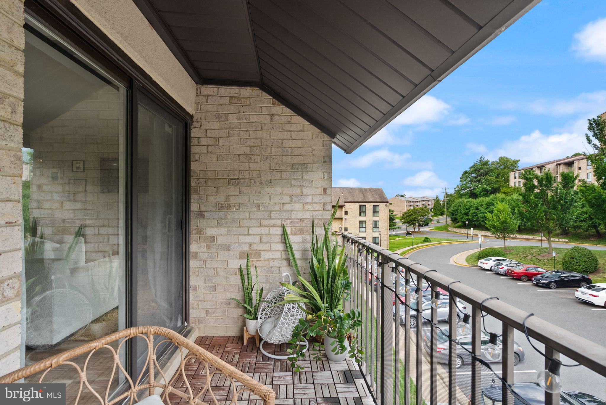 6137 Edsall Road, Unit L Alexandria, VA 22304 - Photo 22 of 36 a view of a balcony with furniture
