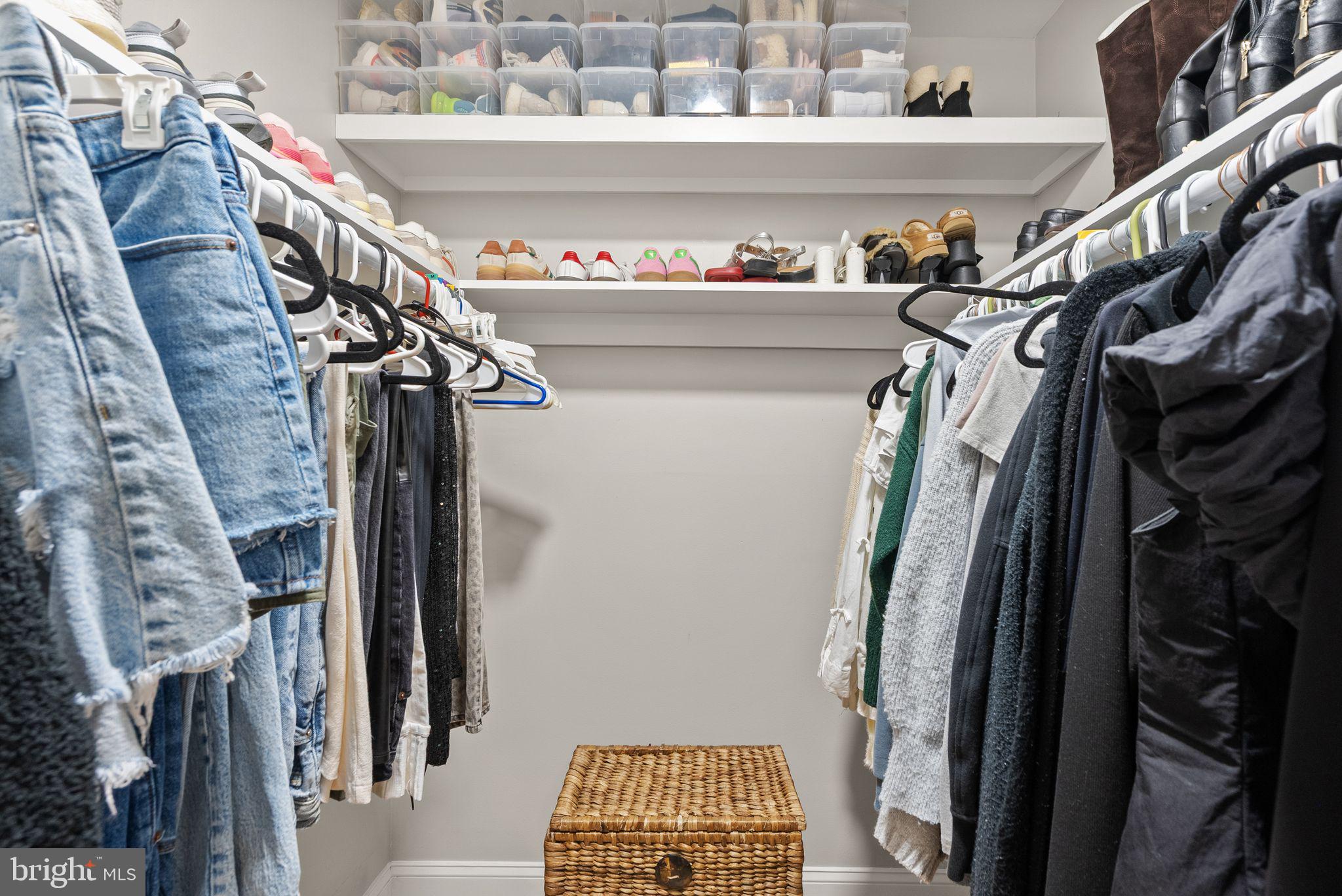 6137 Edsall Road, Unit L Alexandria, VA 22304 - Photo 28 of 36 a view of walk in closet with clothes and shoes