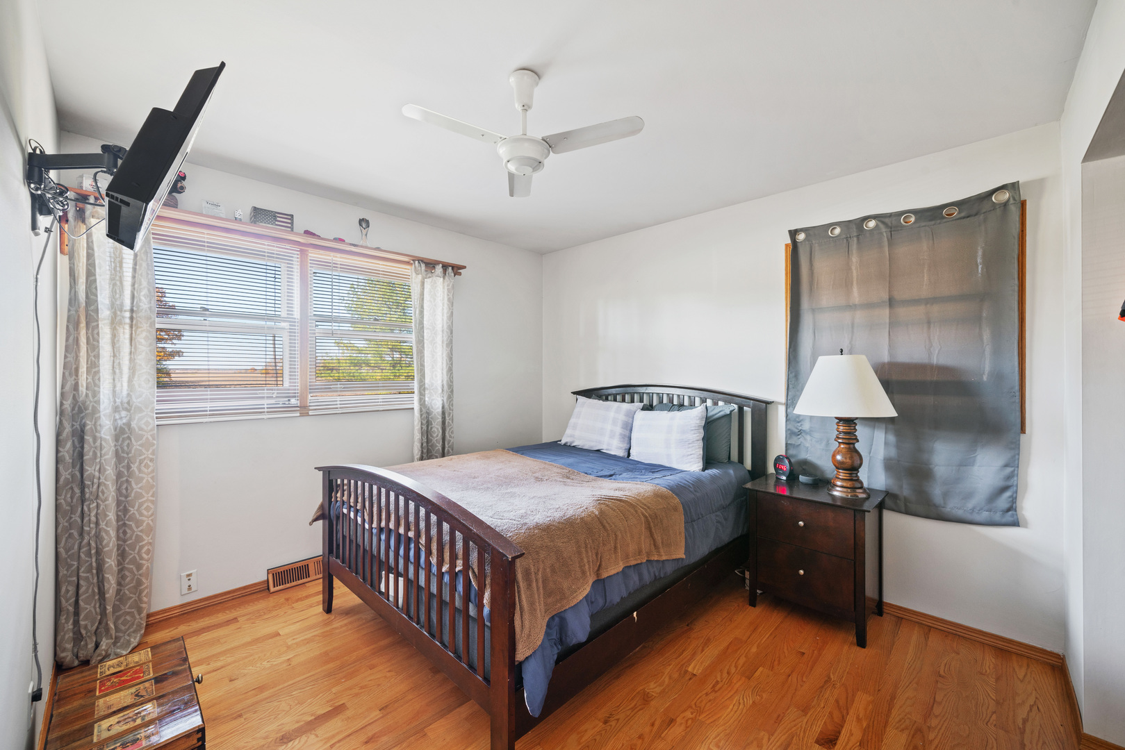 33844 North State Road Genoa, IL 60135 - Photo 13 of 33 a bedroom with a bed and wooden floor