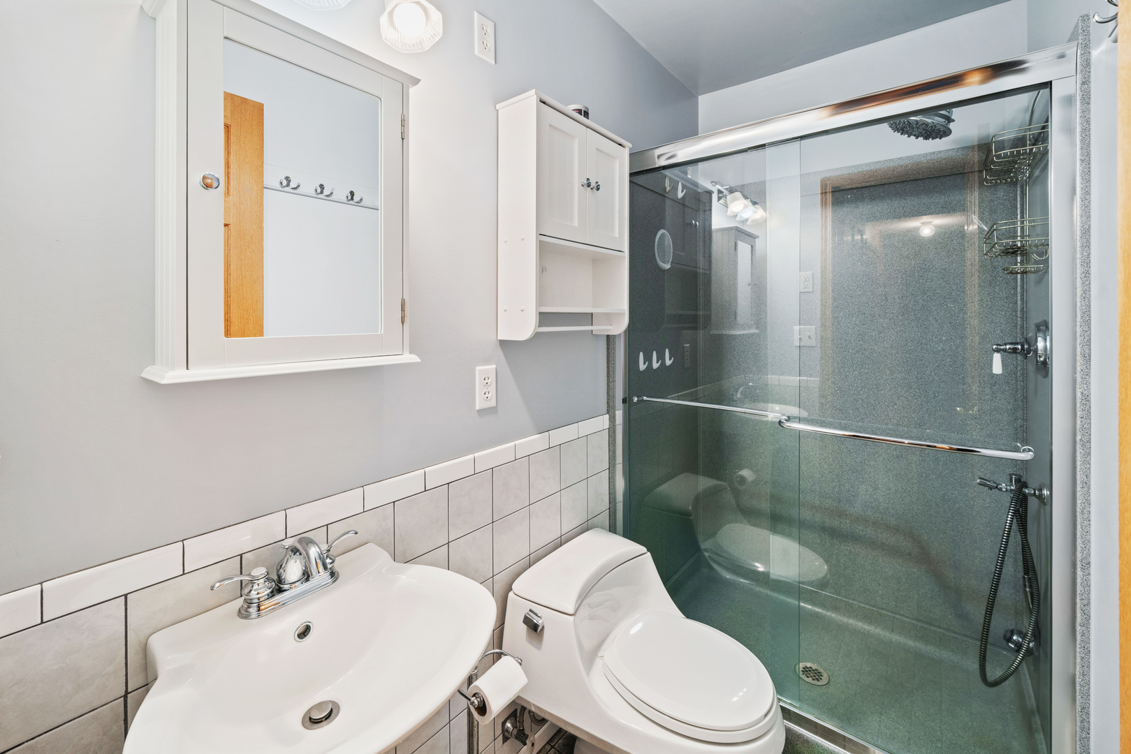 33844 North State Road Genoa, IL 60135 - Photo 14 of 33 a bathroom with a sink mirror vanity and toilet