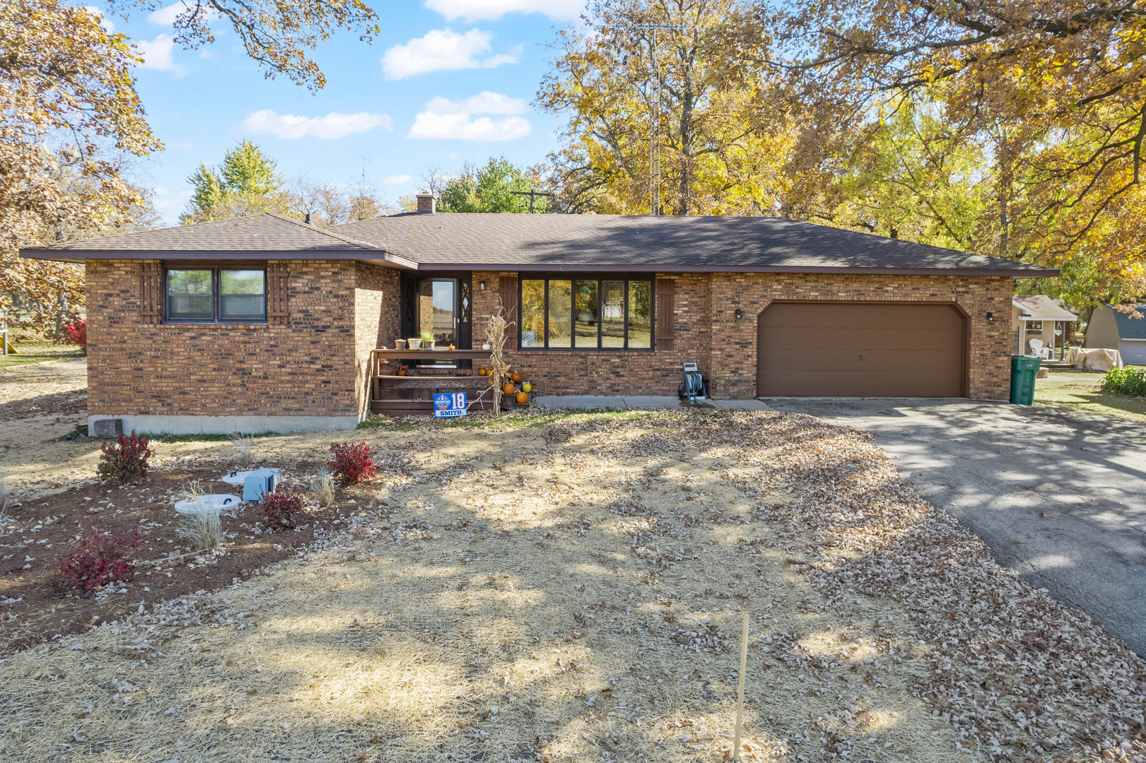 33844 North State Road Genoa, IL 60135 - Photo 2 of 33 a front view of a house with a yard and garage