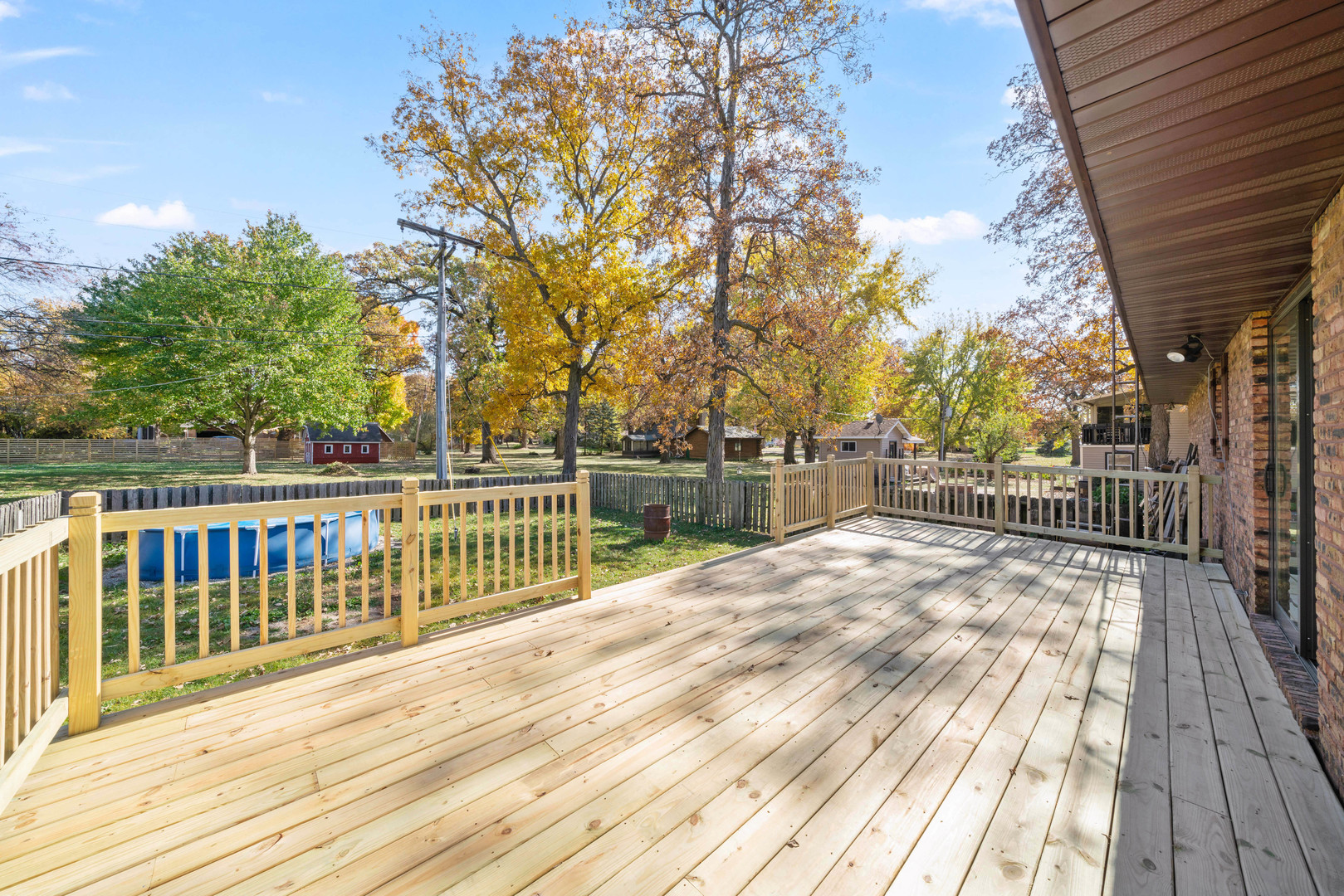 33844 North State Road Genoa, IL 60135 - Photo 23 of 33 a view of balcony with wooden floor and fence