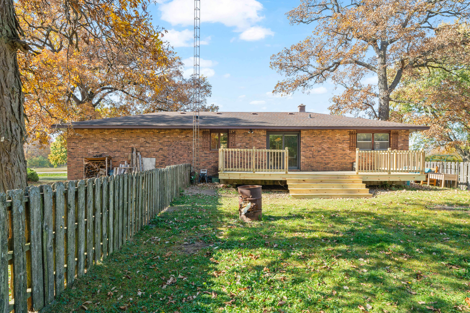 33844 North State Road Genoa, IL 60135 - Photo 29 of 33 a view of a house with backyard and sitting area