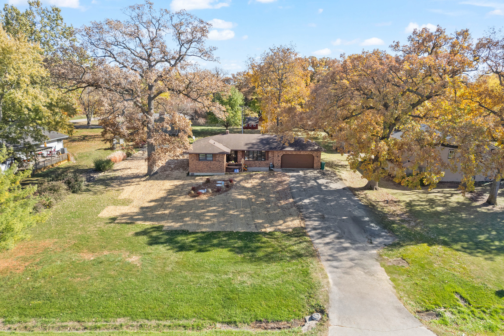33844 North State Road Genoa, IL 60135 - Photo 30 of 33 a backyard of a house with table and chairs