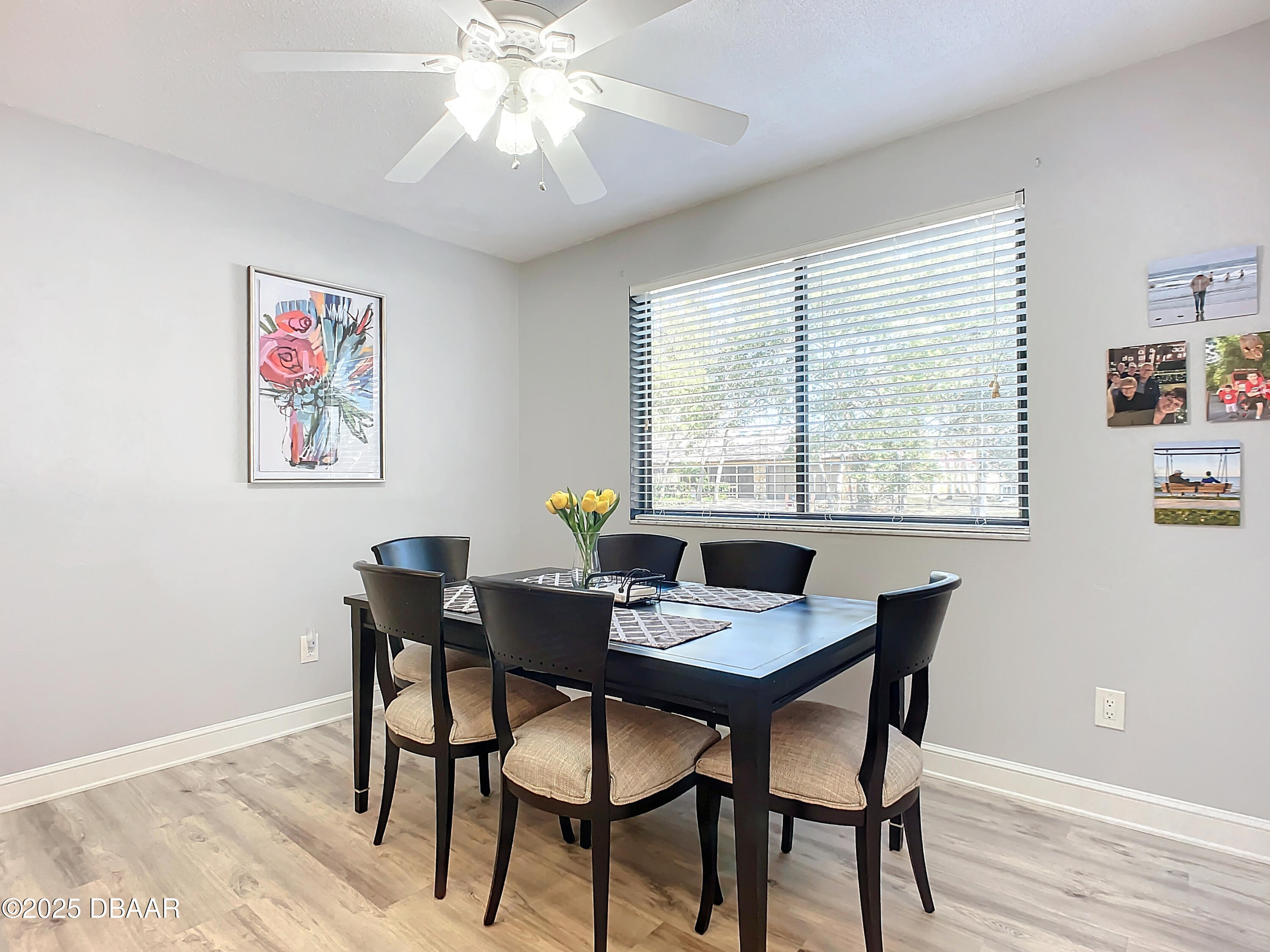 39 Crooked Pine Road Port Orange, FL 32128 - Photo 14 of 47 a view of a dining room with furniture window and wooden floor