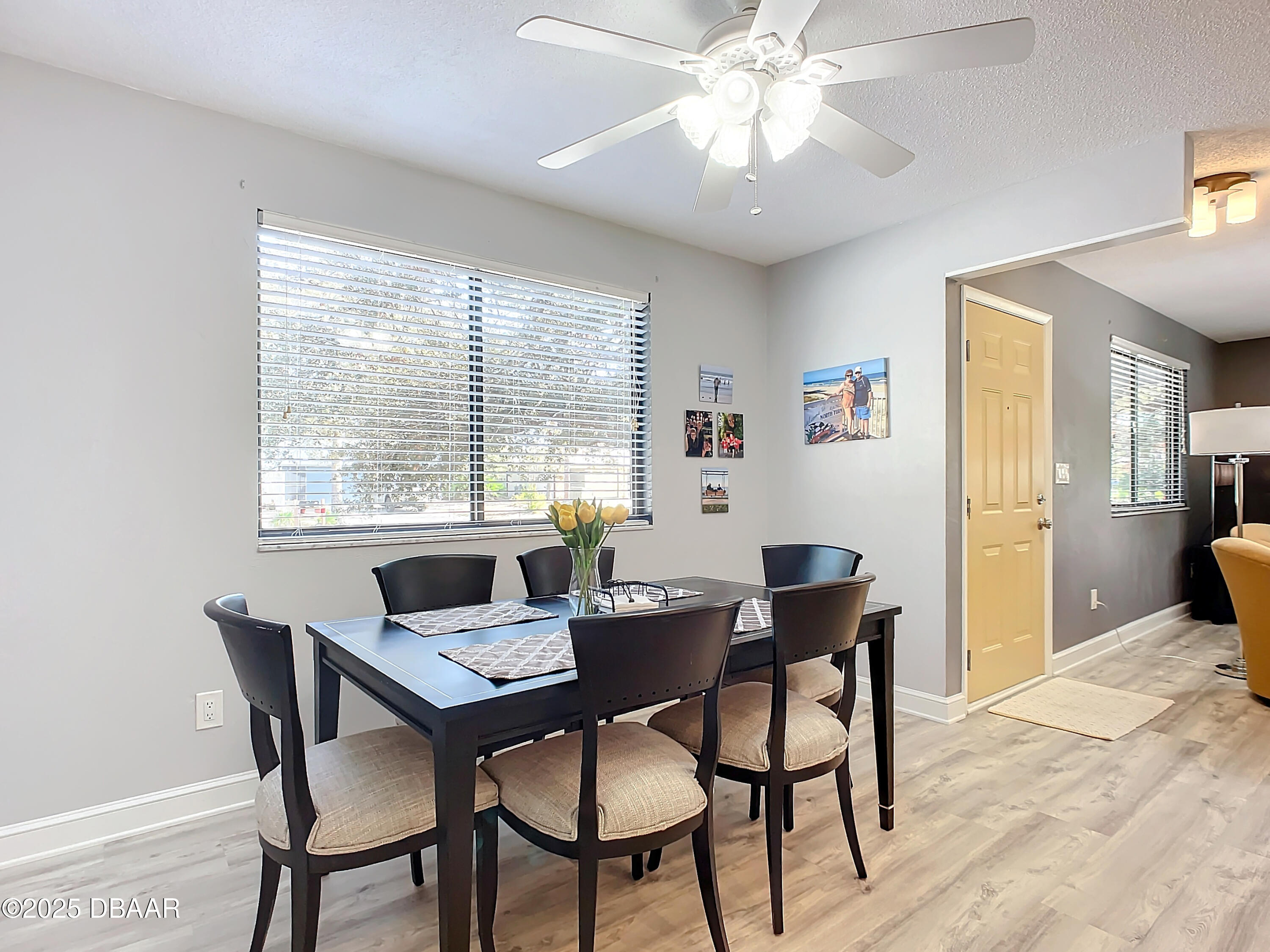 39 Crooked Pine Road Port Orange, FL 32128 - Photo 15 of 47 a view of a dining room with furniture window and wooden floor