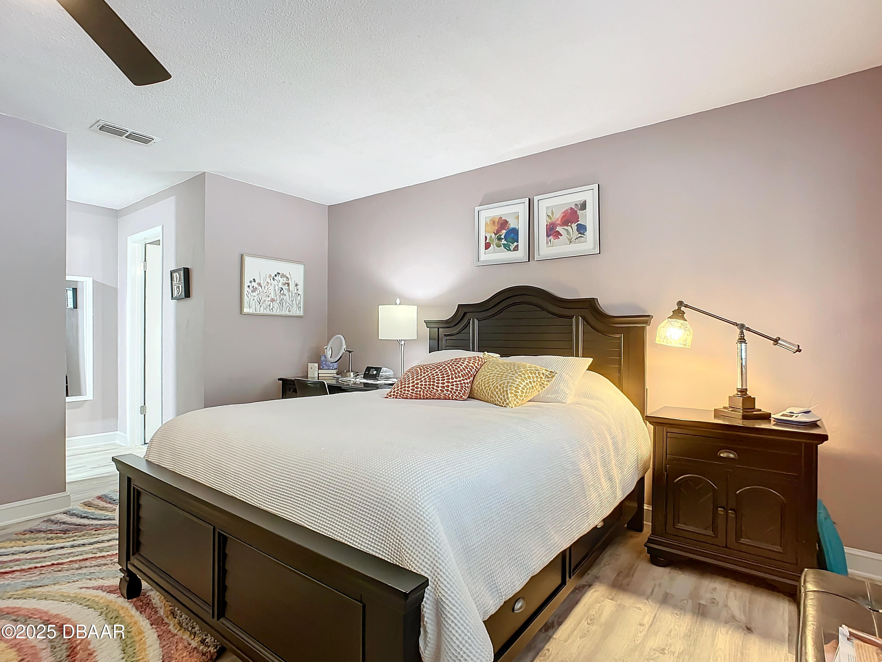 39 Crooked Pine Road Port Orange, FL 32128 - Photo 25 of 47 a bedroom with a bed and dresser