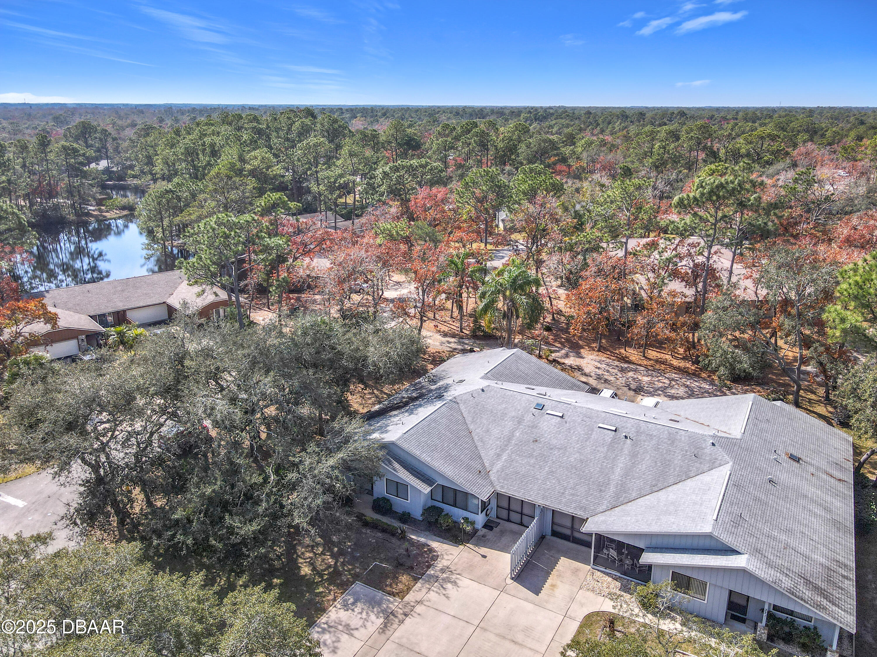 39 Crooked Pine Road Port Orange, FL 32128 - Photo 3 of 47 an aerial view of residential houses with outdoor space and trees