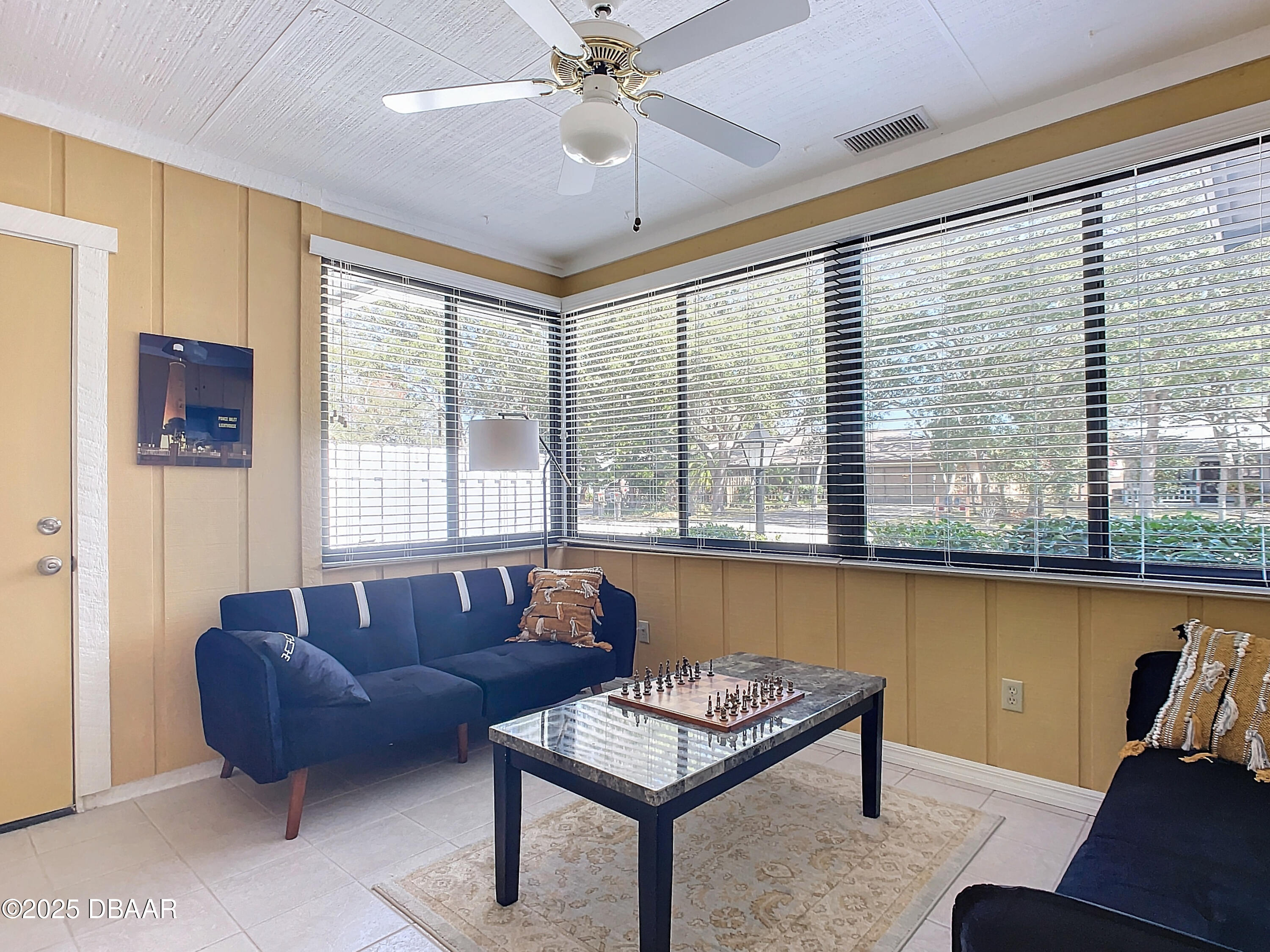 39 Crooked Pine Road Port Orange, FL 32128 - Photo 36 of 47 a living room with furniture and a large window