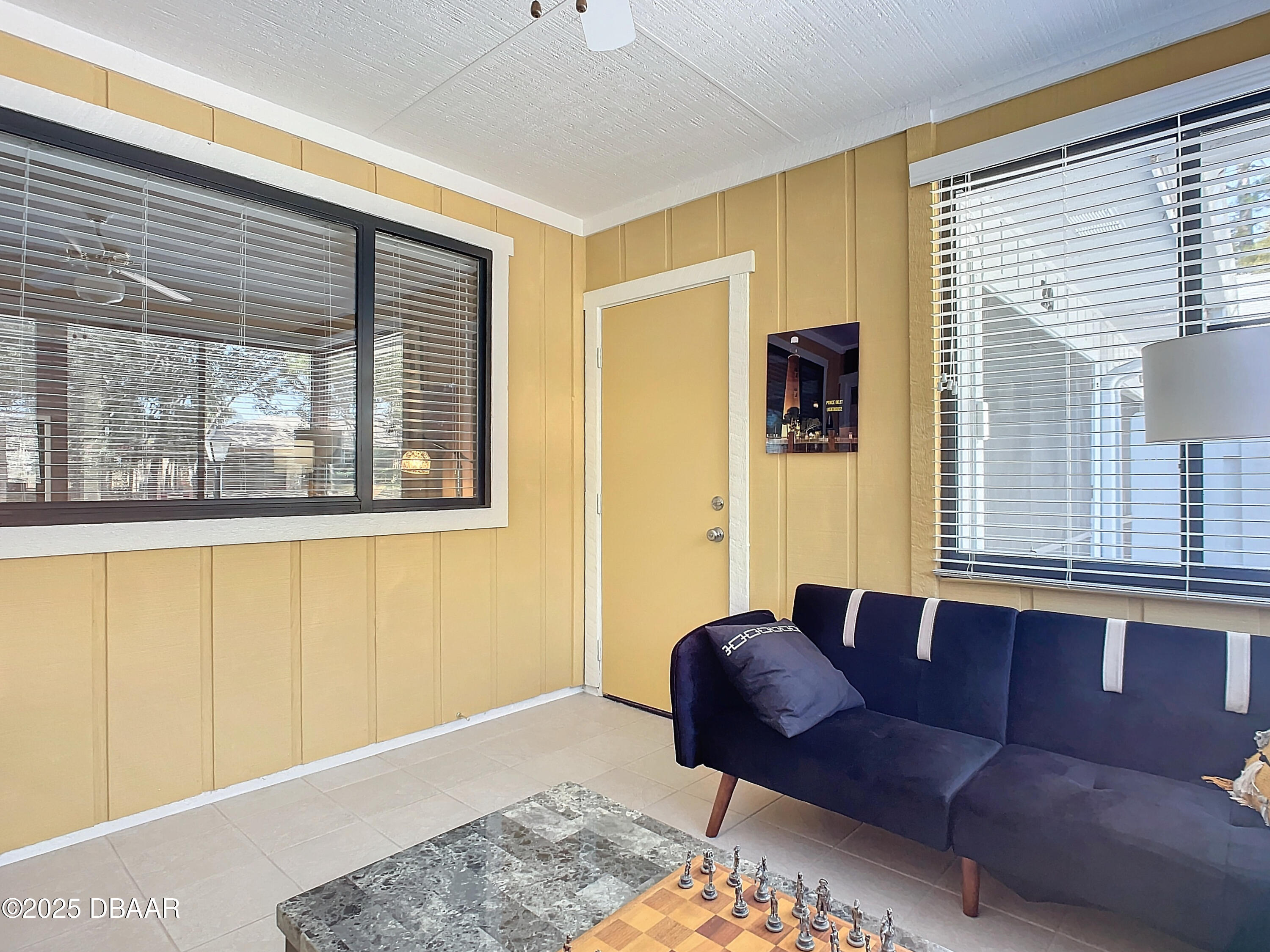 39 Crooked Pine Road Port Orange, FL 32128 - Photo 39 of 47 a living room with furniture and windows