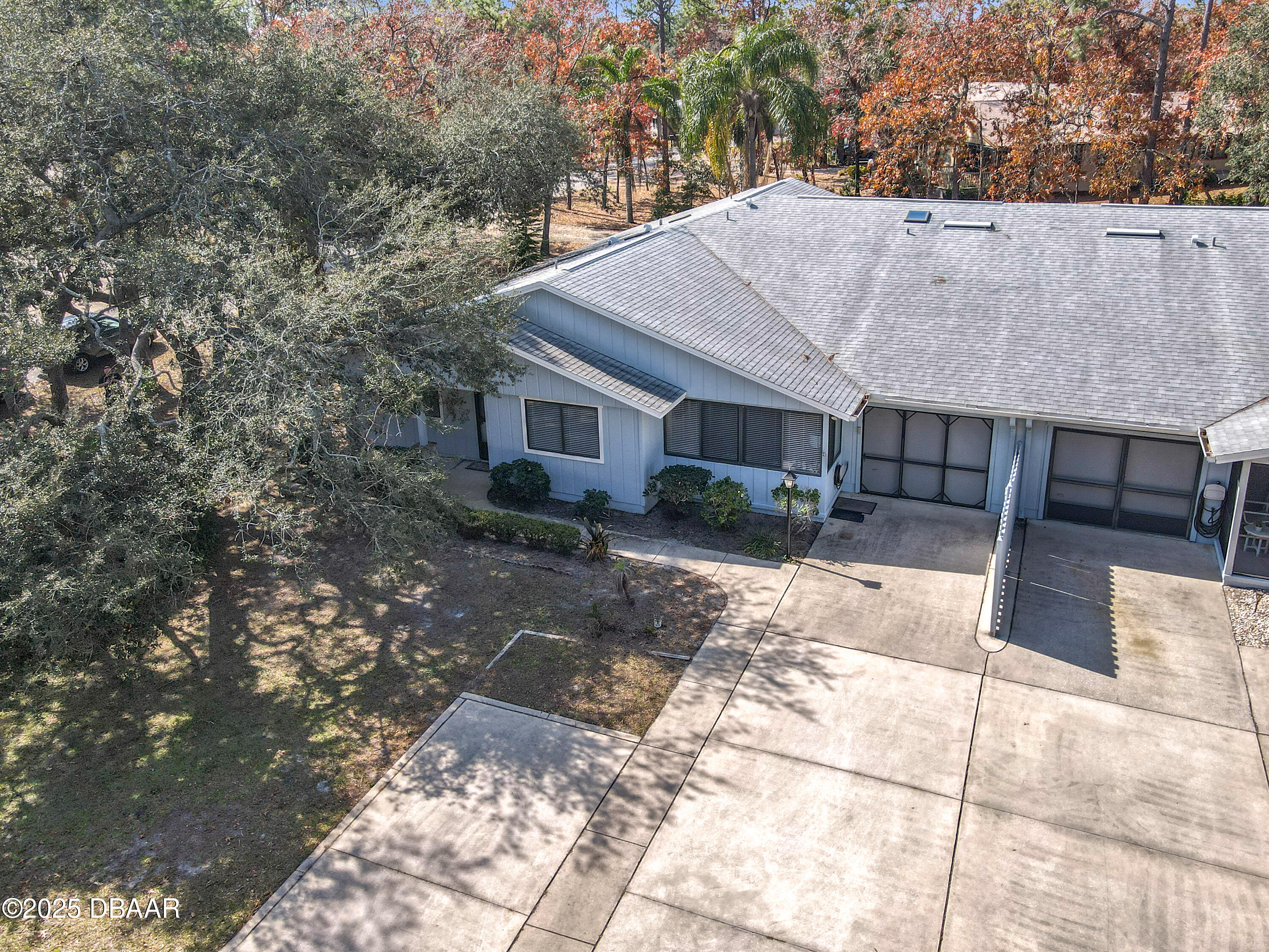 39 Crooked Pine Road Port Orange, FL 32128 - Photo 4 of 47 a view of house with yard and outdoor seating