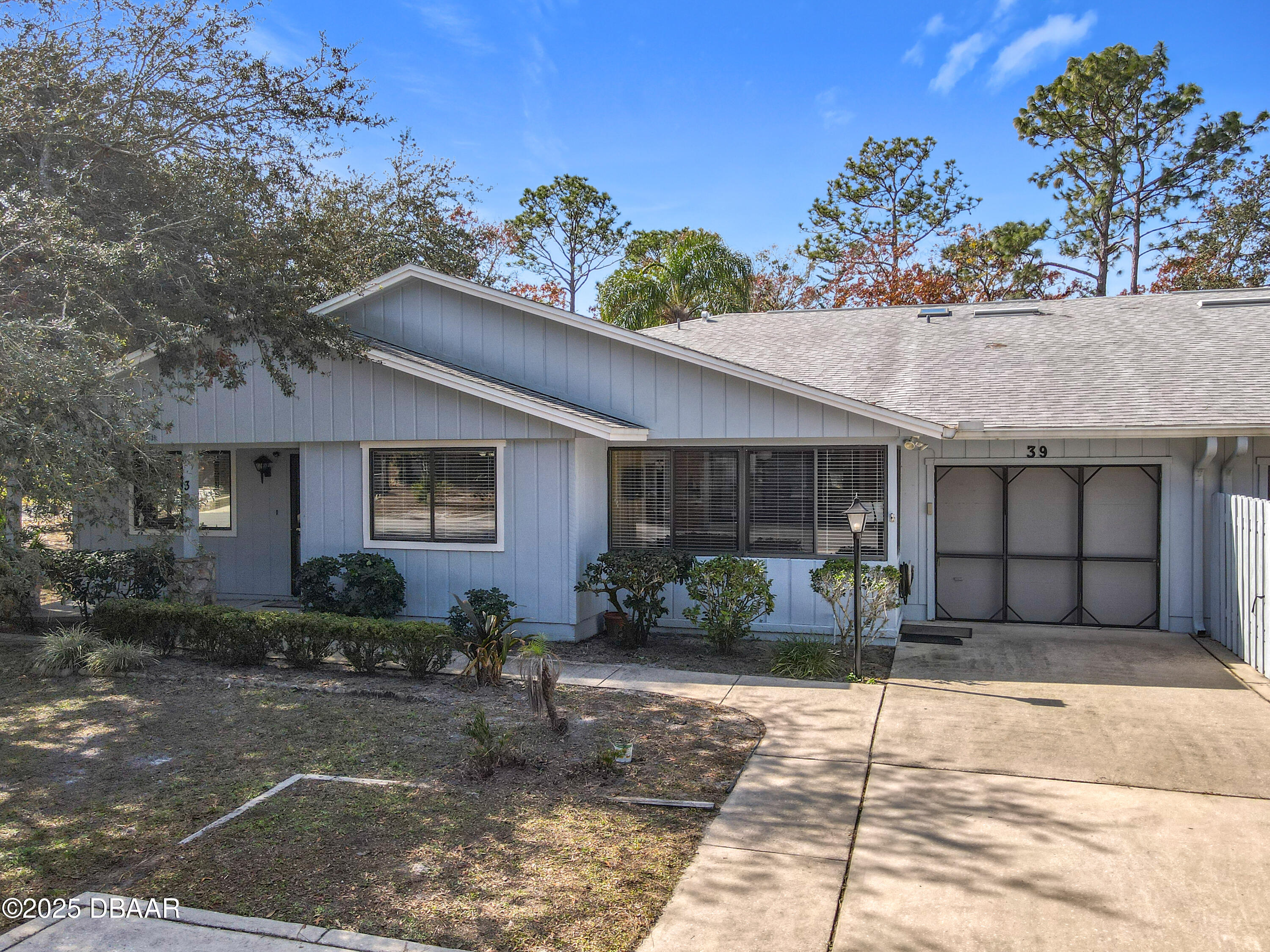39 Crooked Pine Road Port Orange, FL 32128 - Photo 5 of 47 a house view with a outdoor space