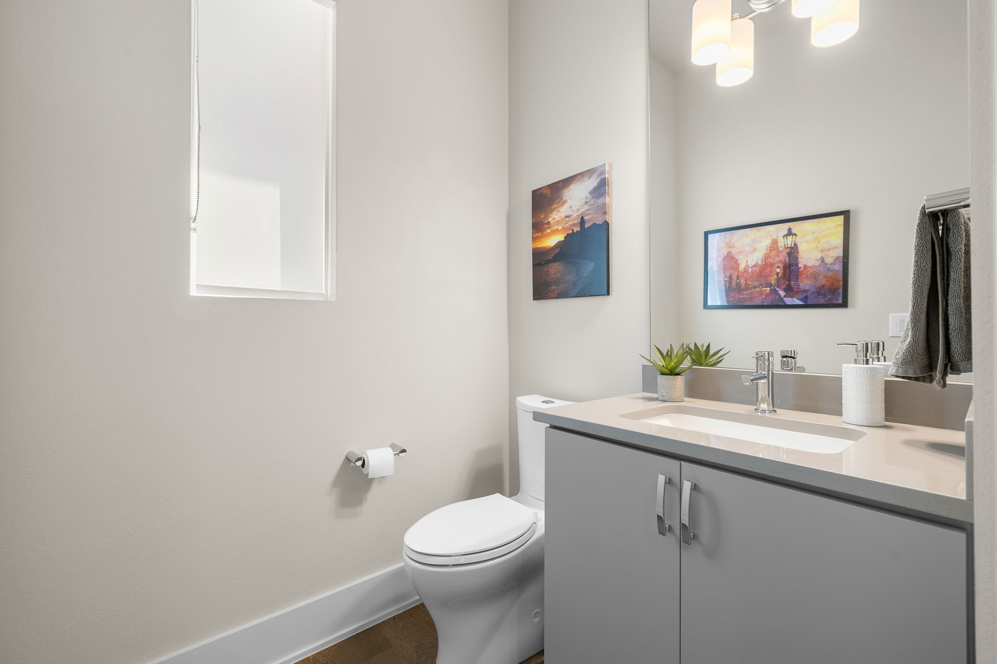 5214 Pink Poppy Pass Austin, TX 78735 - Photo 13 of 34 Bathroom with vanity and dark wood-style flooring