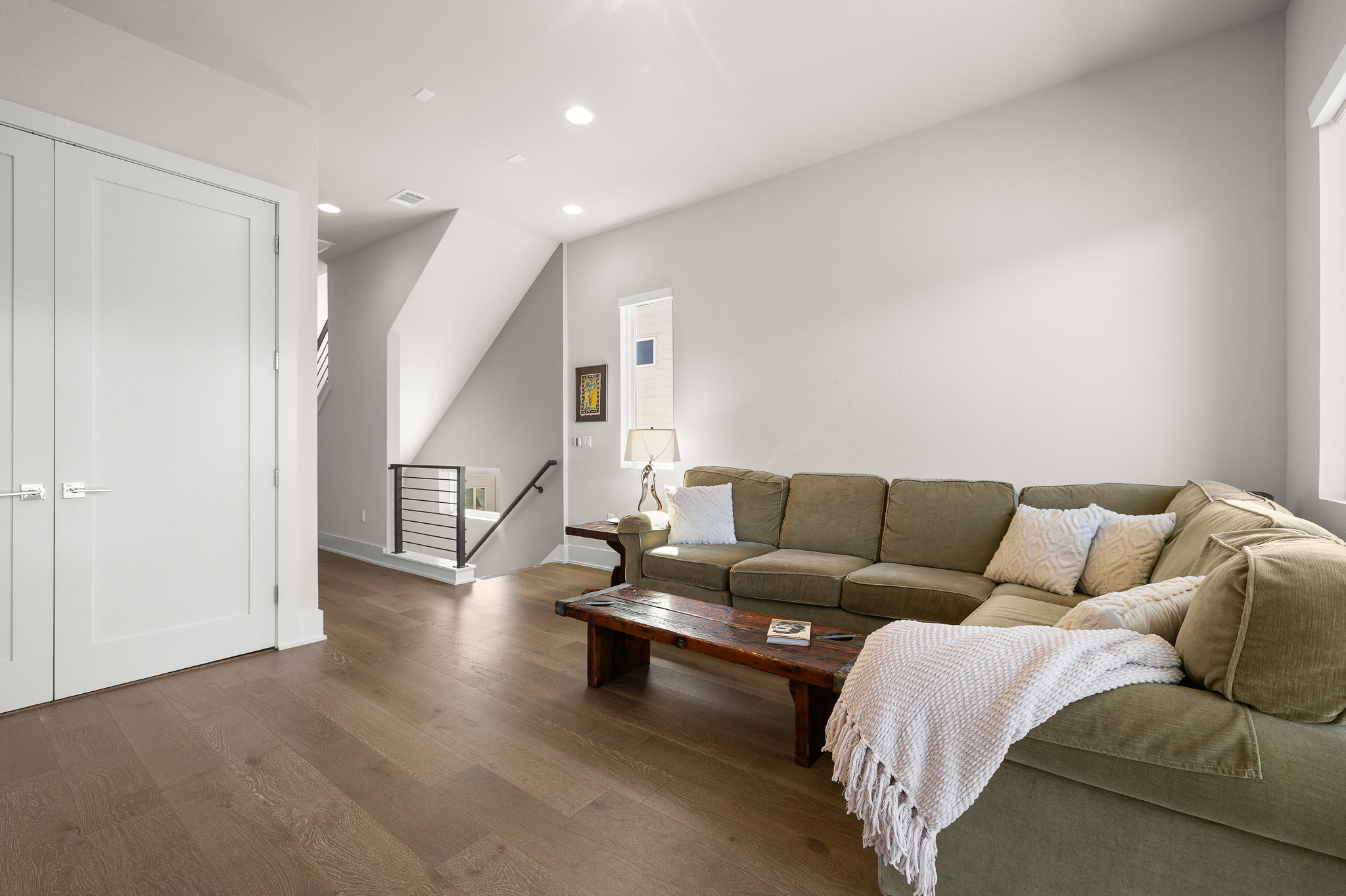 5214 Pink Poppy Pass Austin, TX 78735 - Photo 23 of 34 Living room featuring dark wood-style flooring and recessed lighting