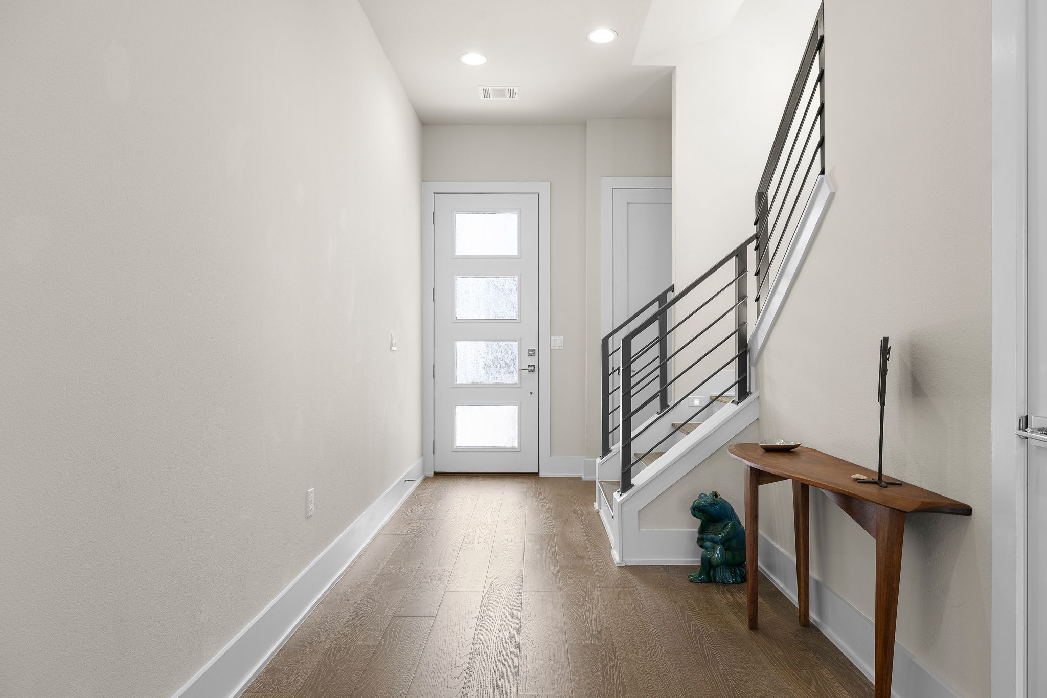5214 Pink Poppy Pass Austin, TX 78735 - Photo 5 of 34 Foyer featuring hardwood / wood-style floors and recessed lighting