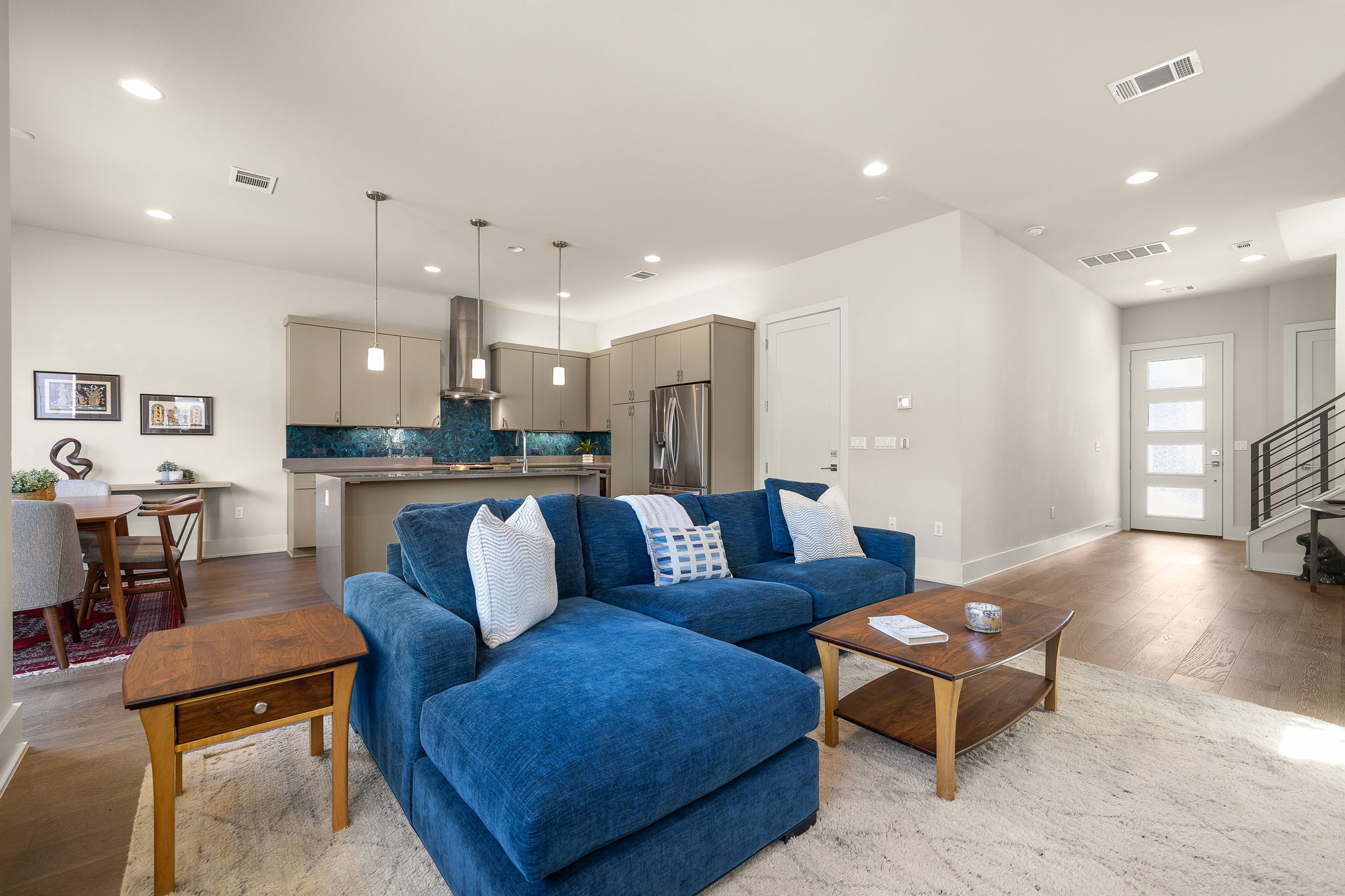 5214 Pink Poppy Pass Austin, TX 78735 - Photo 8 of 34 Living area featuring light wood-type flooring and recessed lighting