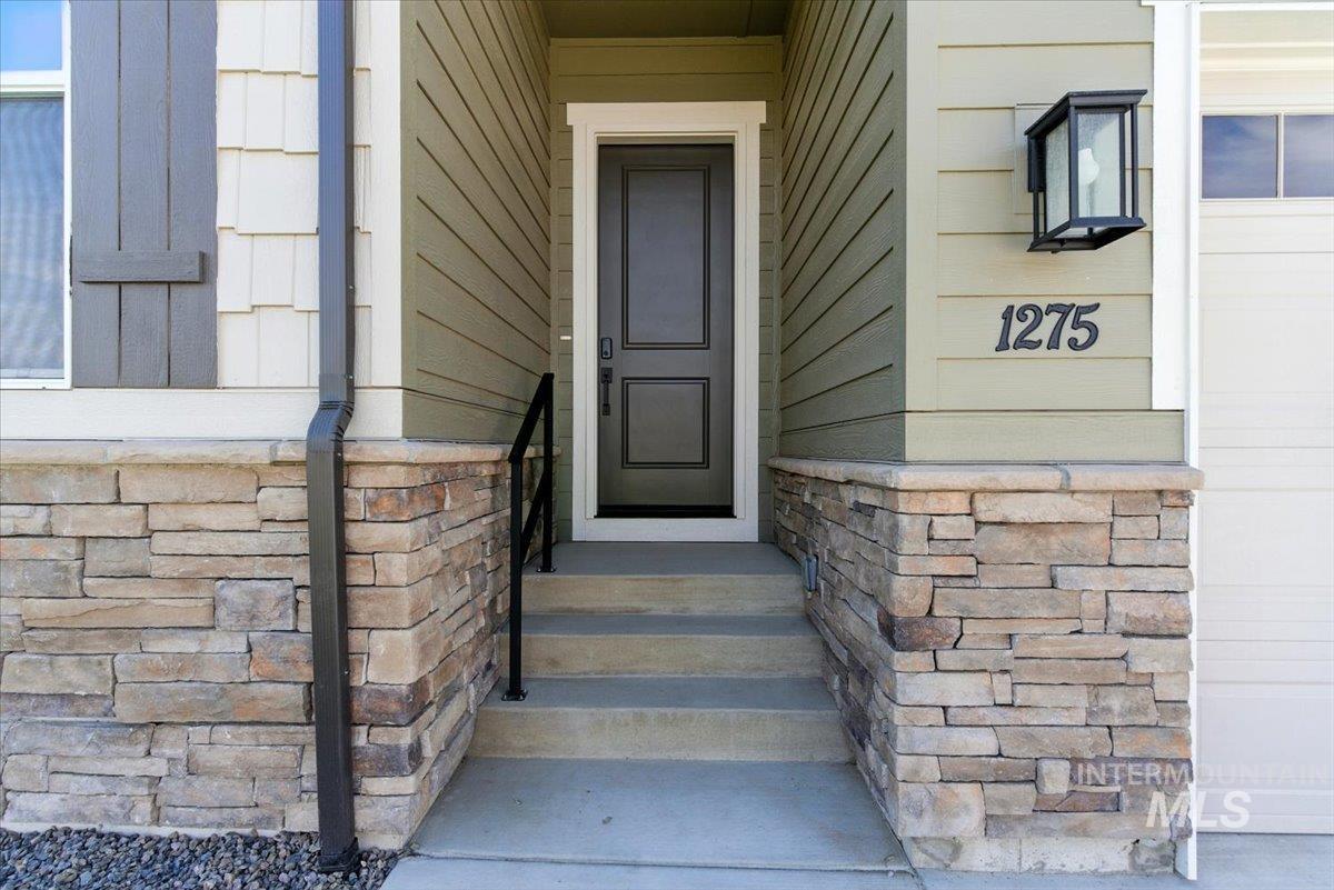 1275 Stirling Mdws Street Middleton, ID 83644 - Photo 2 of 42 Property entrance with stone siding