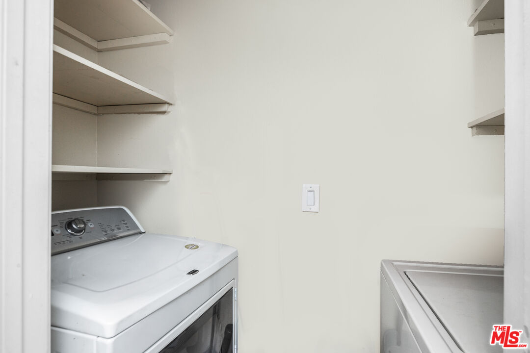 3800 Stocker Street, Unit 23 View Park, CA 90008 - Photo 9 of 33 a utility room with dryer and washer