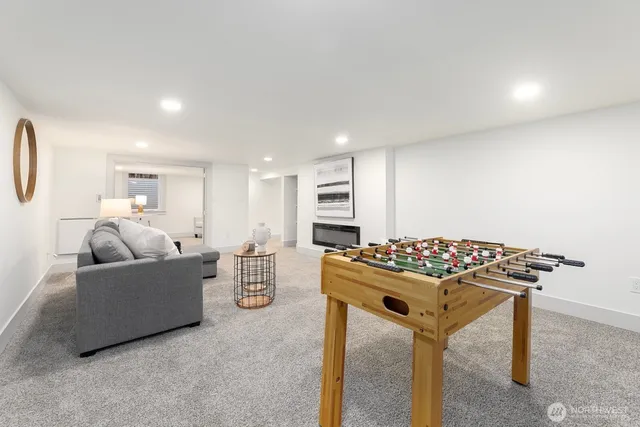 a living room with furniture and a table