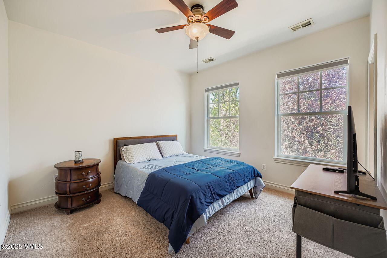 270 Founders Avenue Eagle, CO 81631 - Photo 20 of 28 a bedroom with a bed and a window