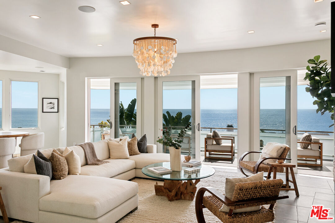 31558 Victoria Point Road Malibu, CA 90265 - Photo 4 of 55 a living room with furniture