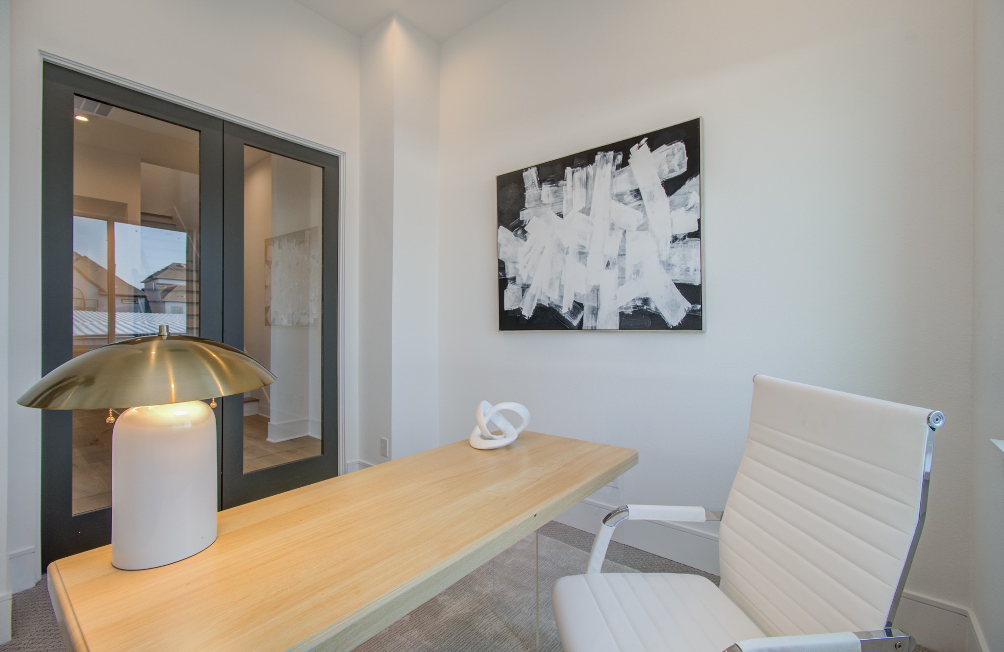 1643 Bingle Road Houston, TX 77055 - Photo 31 of 50 a bedroom with a bed and a painting on the wall