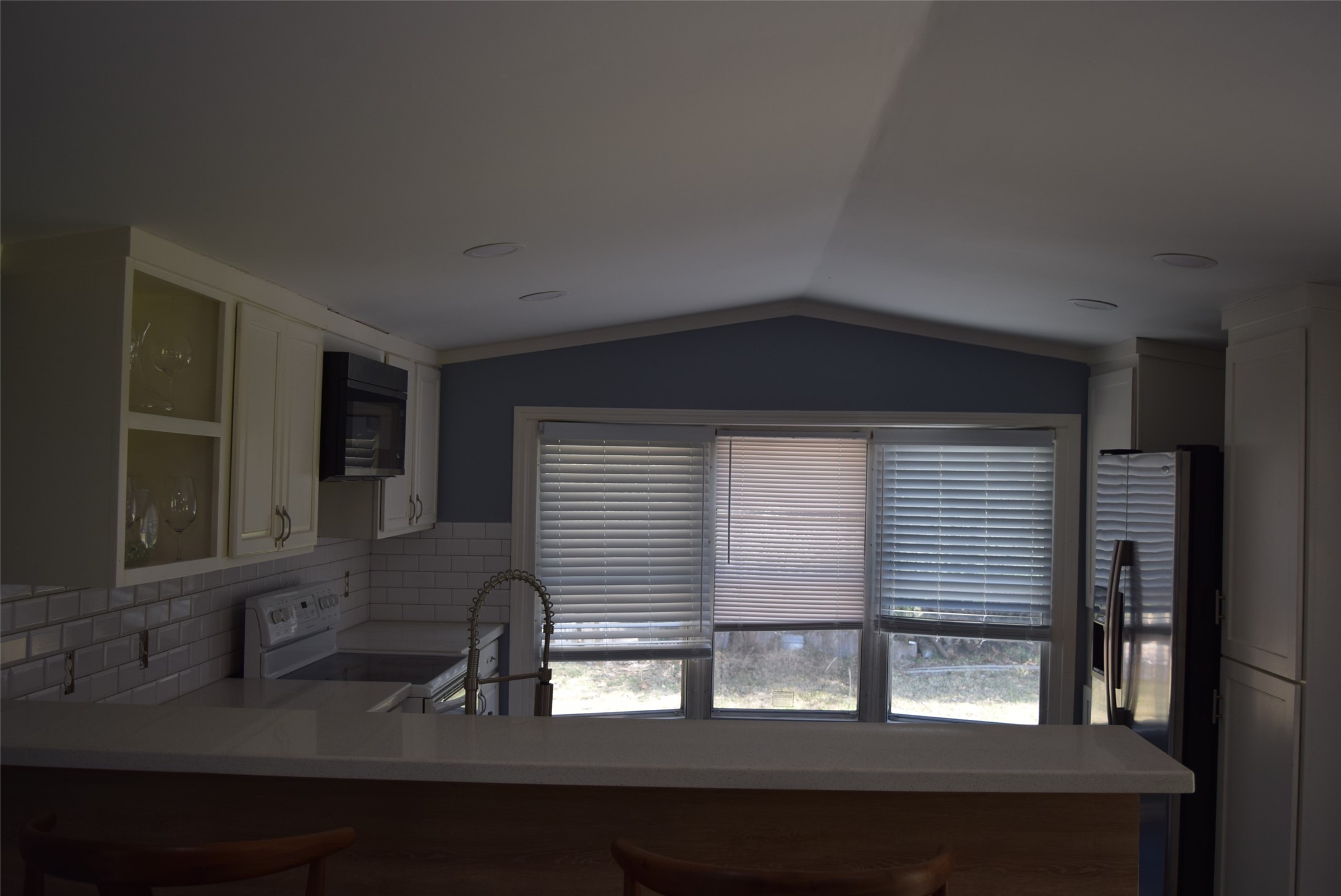 161 Irene Street Shepherd, TX 77371 - Photo 12 of 27 a kitchen that has a sink and a window