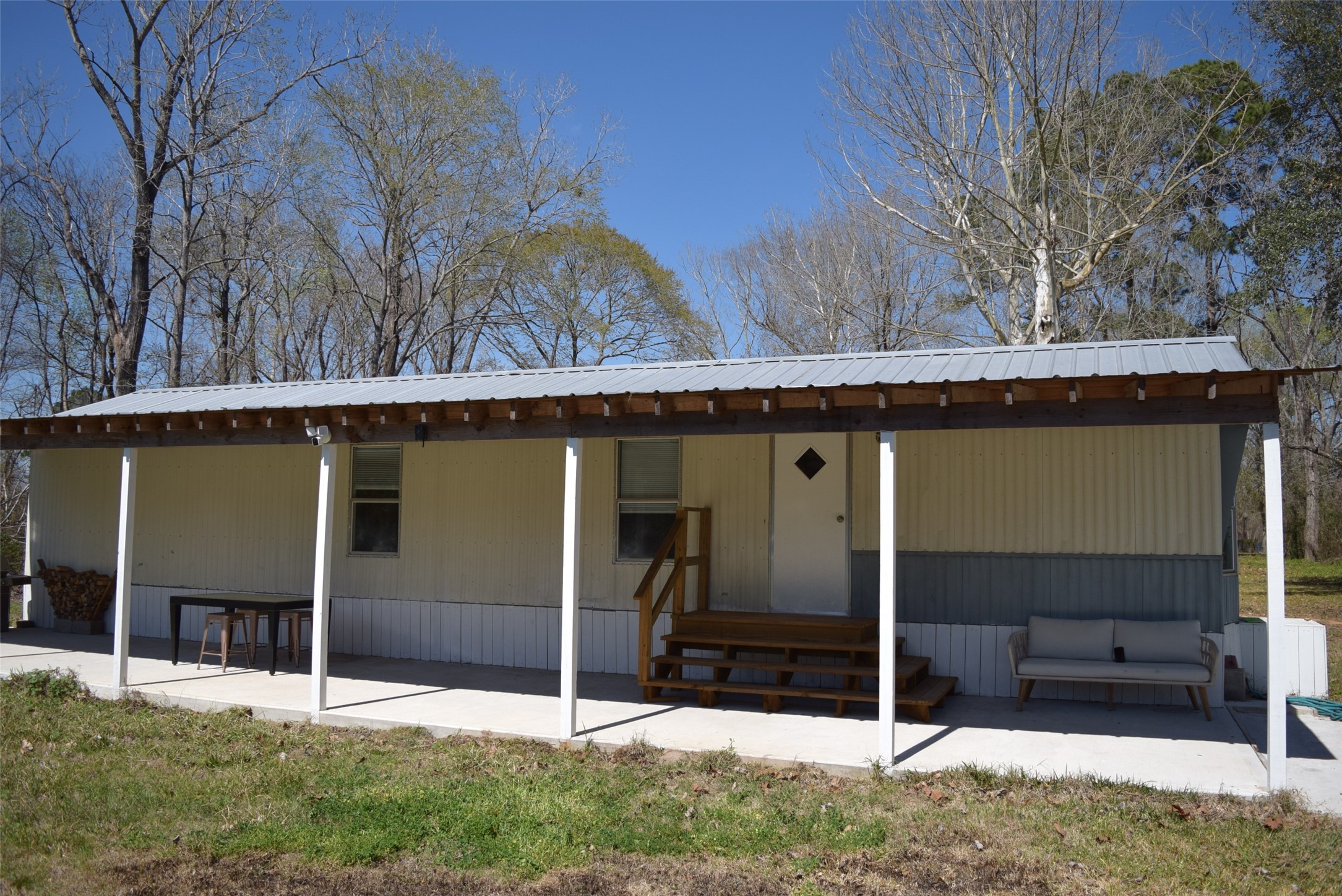 161 Irene Street Shepherd, TX 77371 - Photo 2 of 27 a backyard of a house