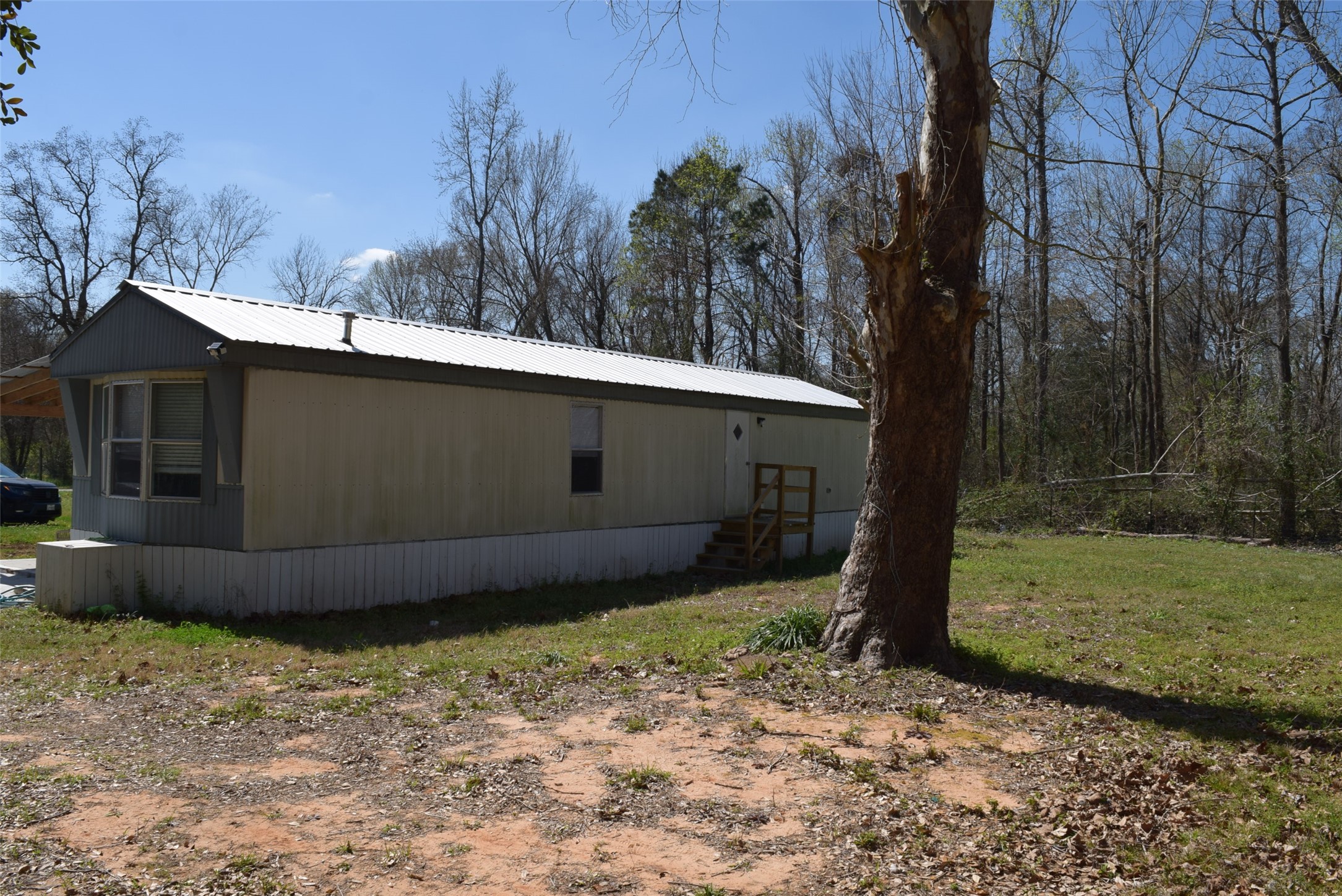 161 Irene Street Shepherd, TX 77371 - Photo 26 of 27 a view of a backyard