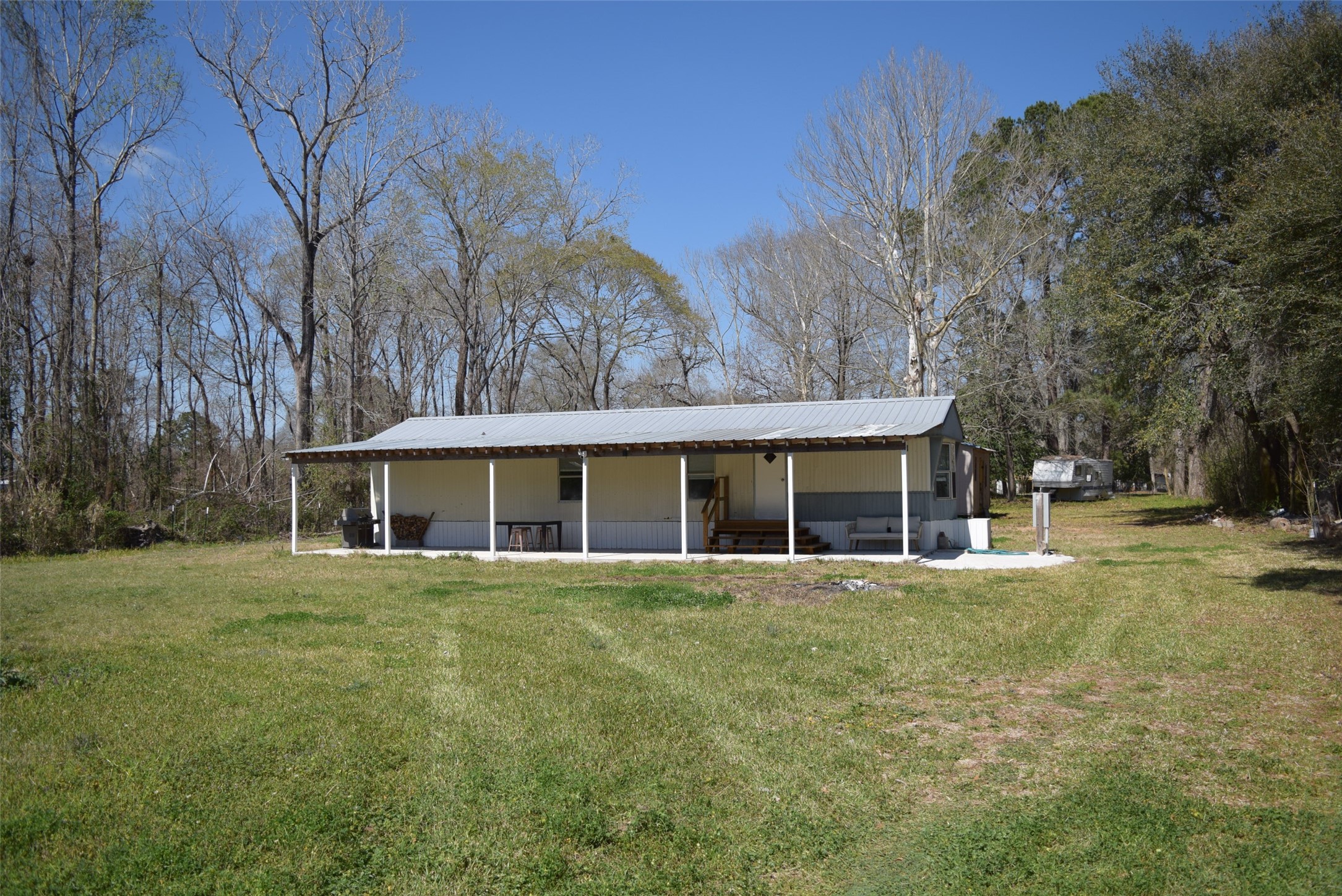 161 Irene Street Shepherd, TX 77371 - Photo 6 of 27 front view of a house with a yard