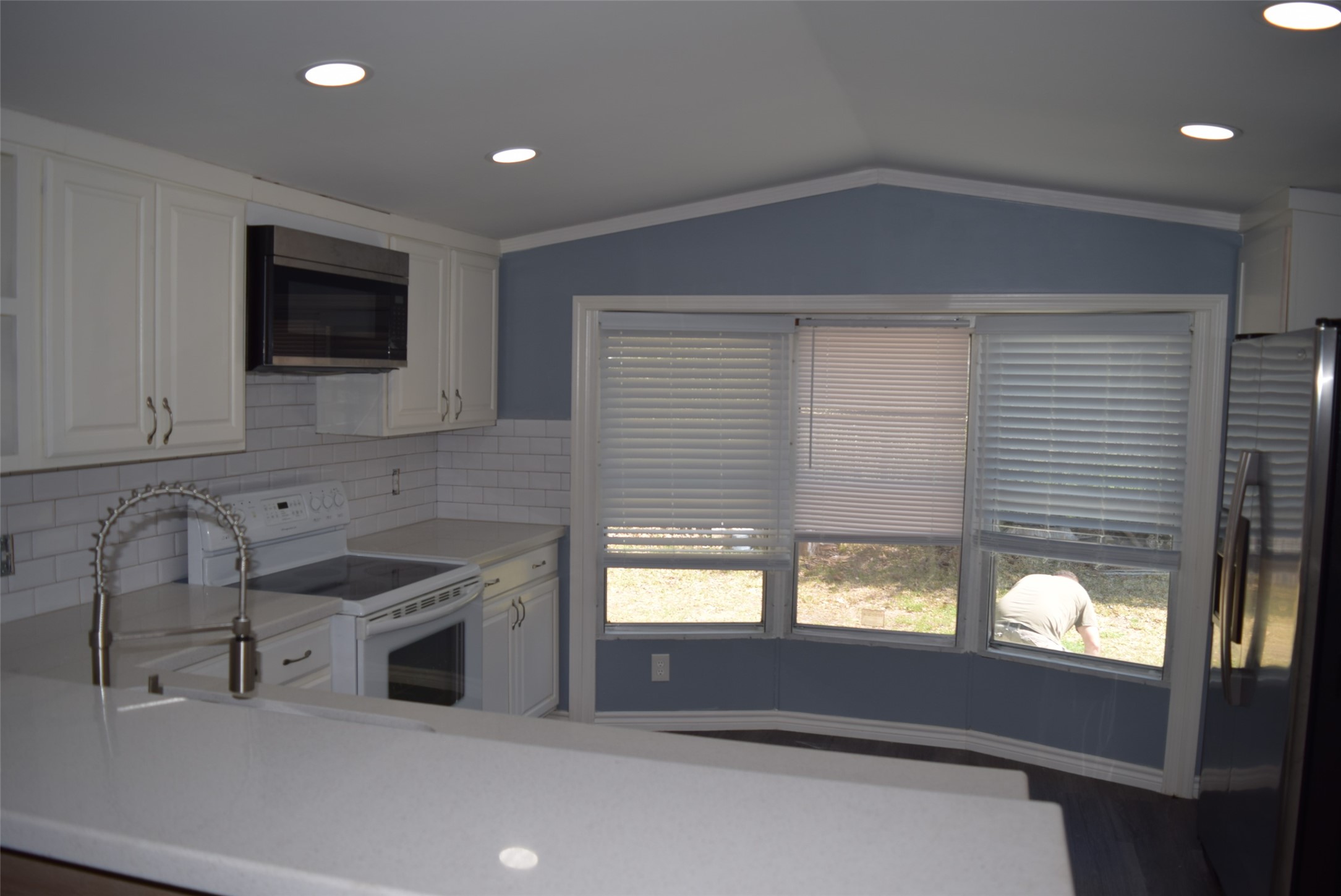 161 Irene Street Shepherd, TX 77371 - Photo 8 of 27 a kitchen with a sink and a window